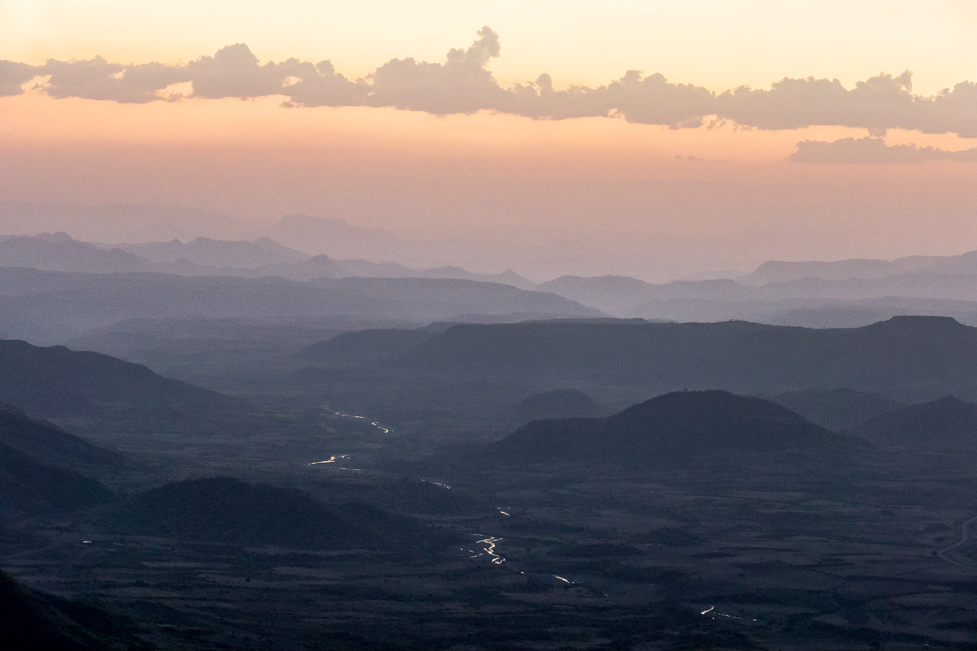 Evening colours and clouds descend on the hills and valleys around Lalibela, Ethiopia
