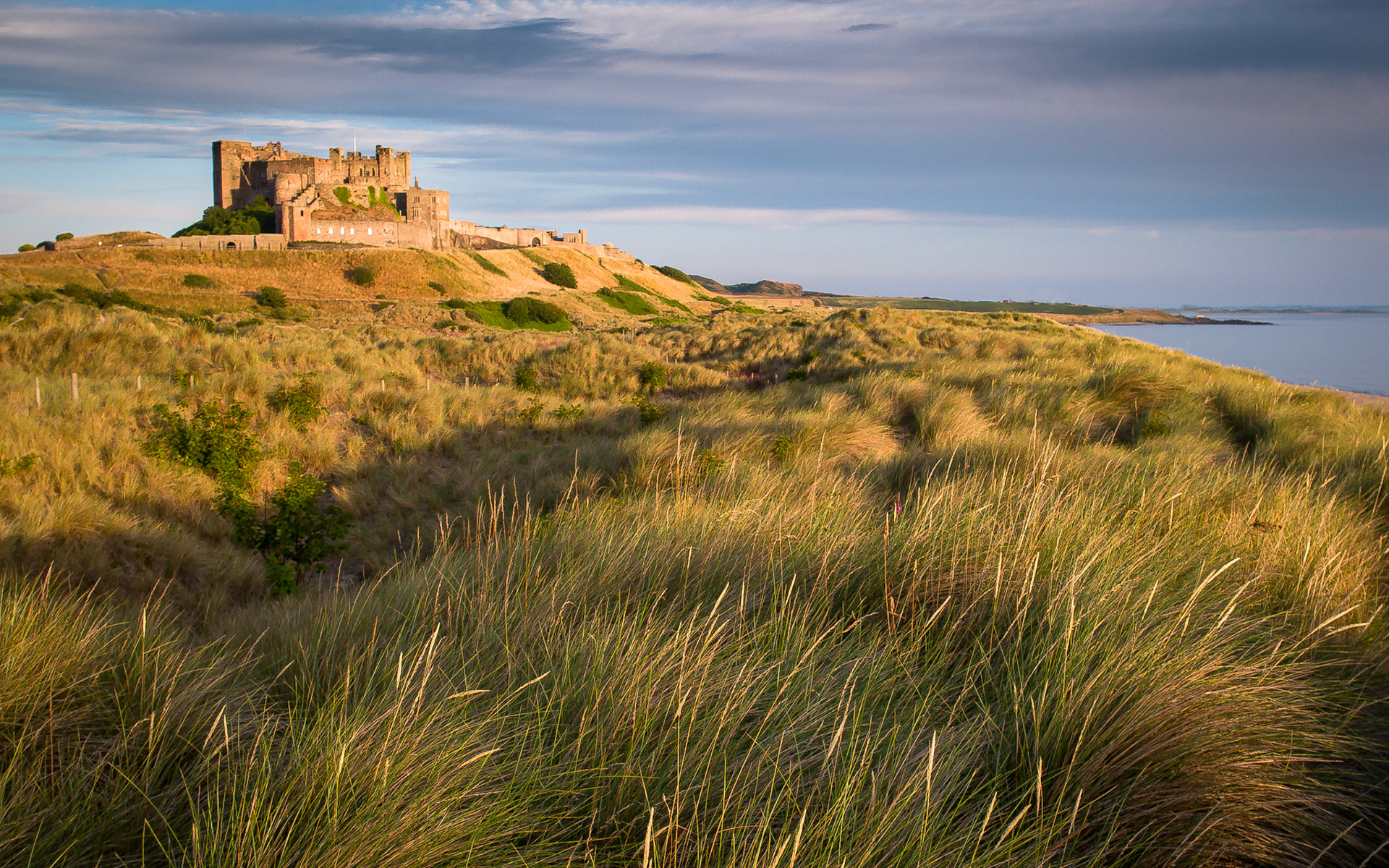 Bamburgh Castle sits on a basalt outcrop at the edge of the North Sea