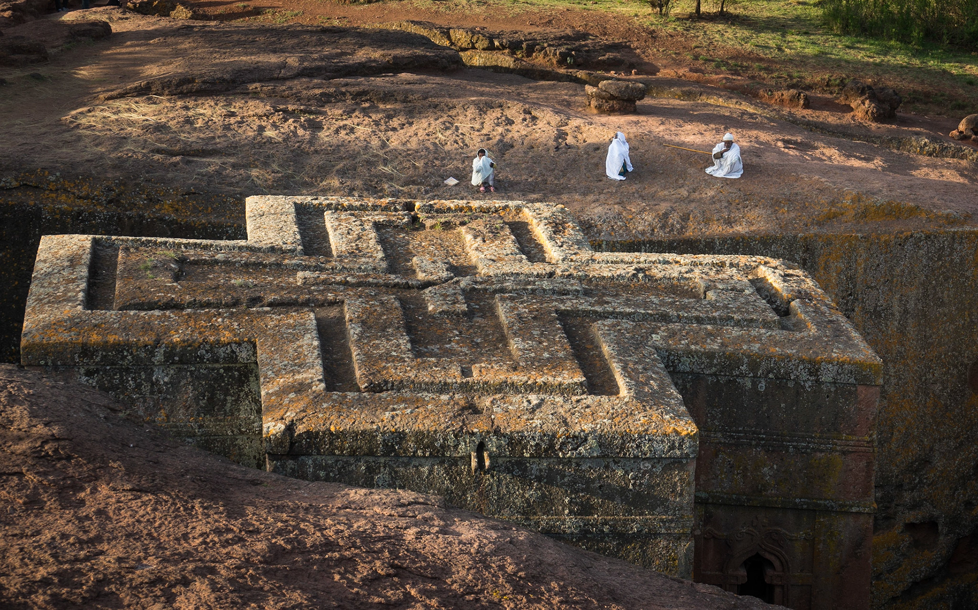 A group of parishoners pray above Biete St. Giyorges, Lalibela, Ethiopia