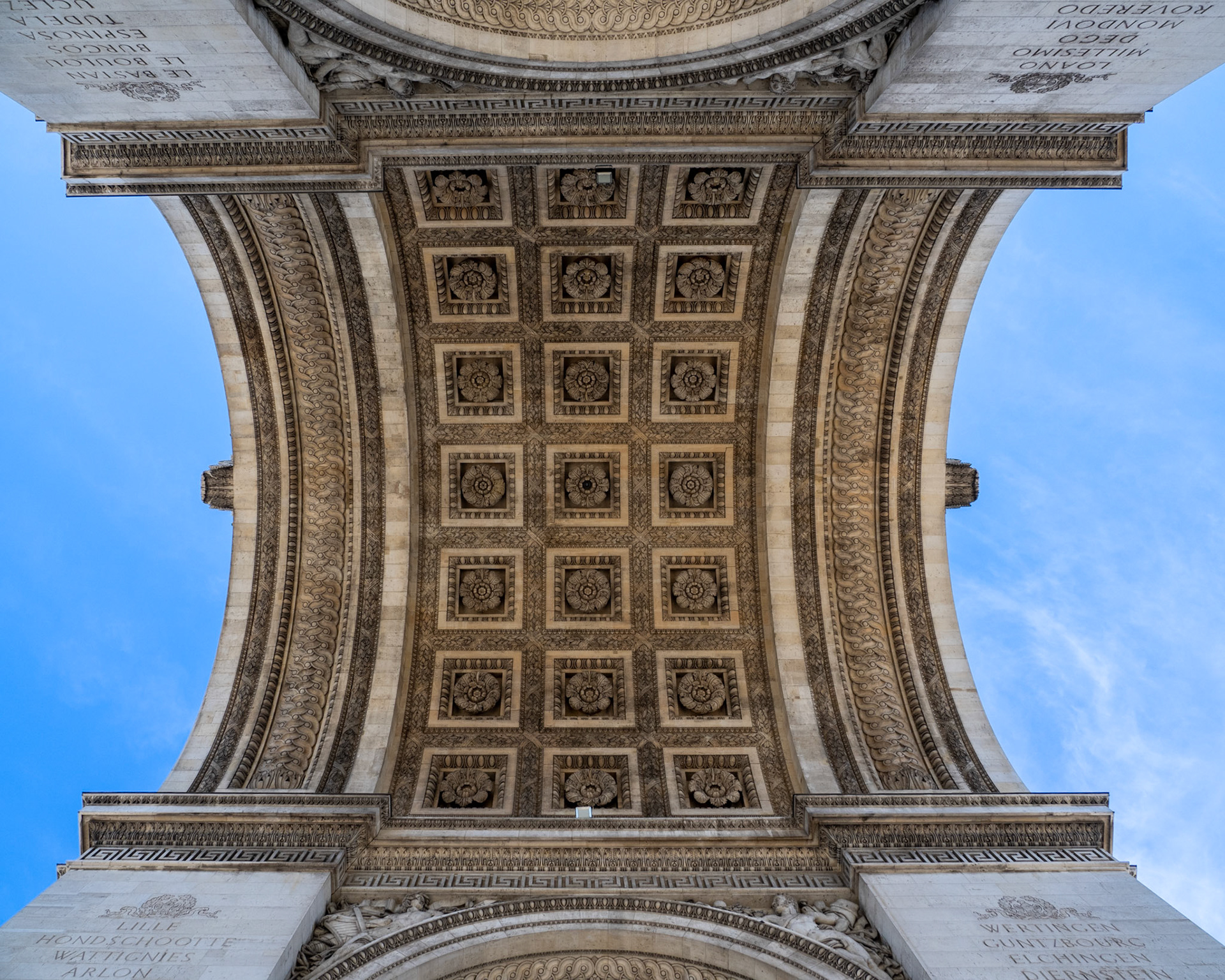 The patterns and designs created in the curving underside of the Arc de Triomphe