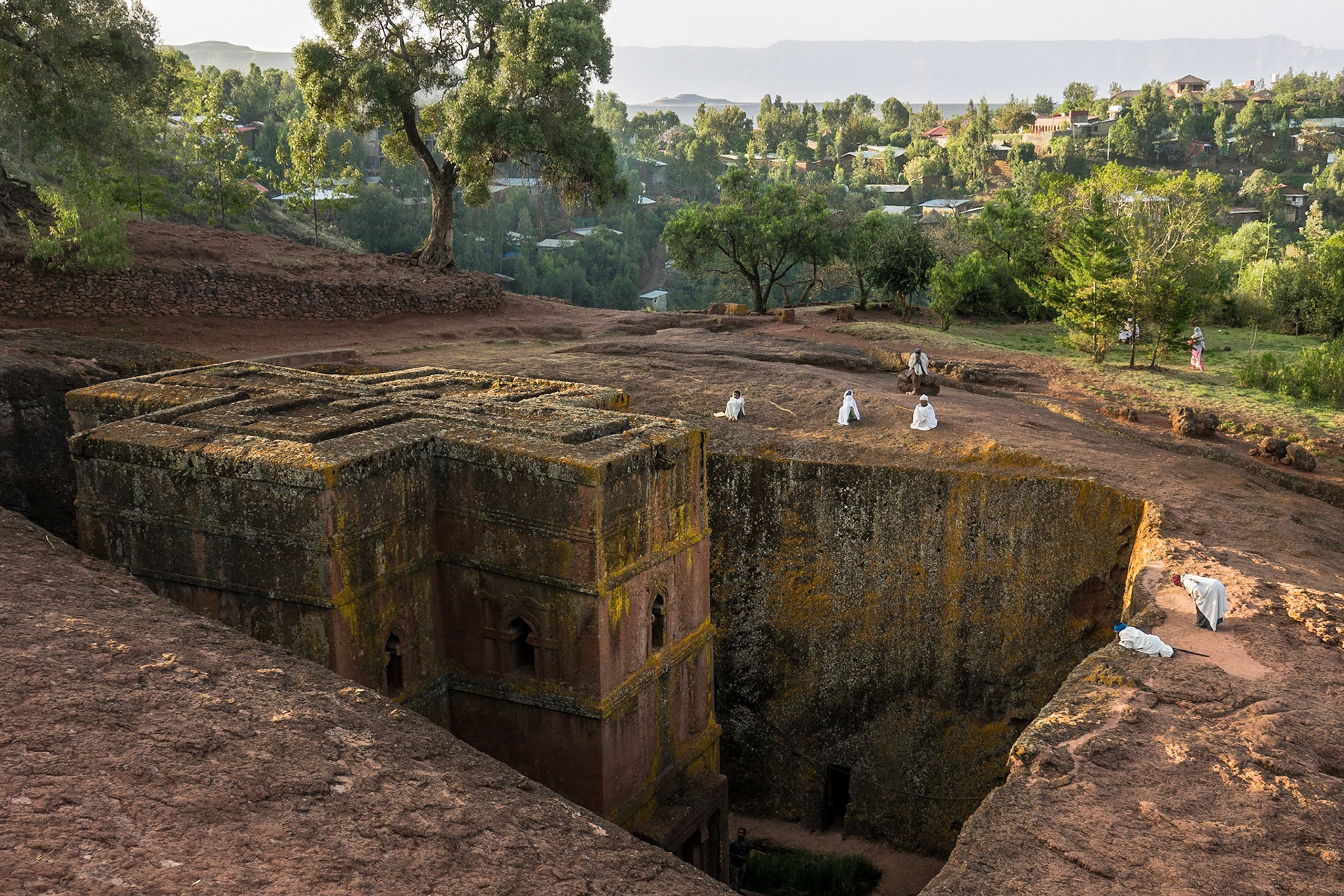 A group of parishoners pray above Biete St. Giyorges, Lalibela, Ethiopia