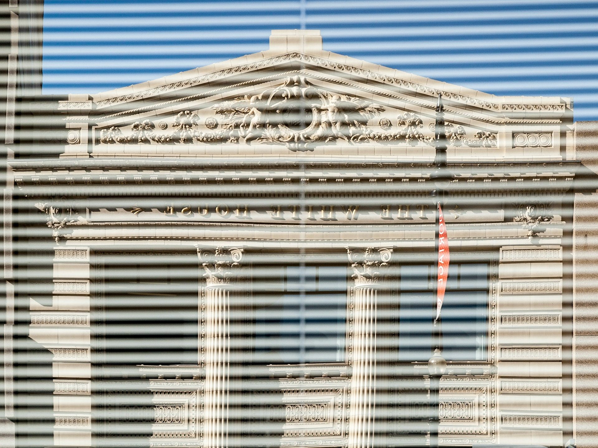 The White House, reflection through the blinds, The Exchange District, Winnipeg, Manitoba, Canada