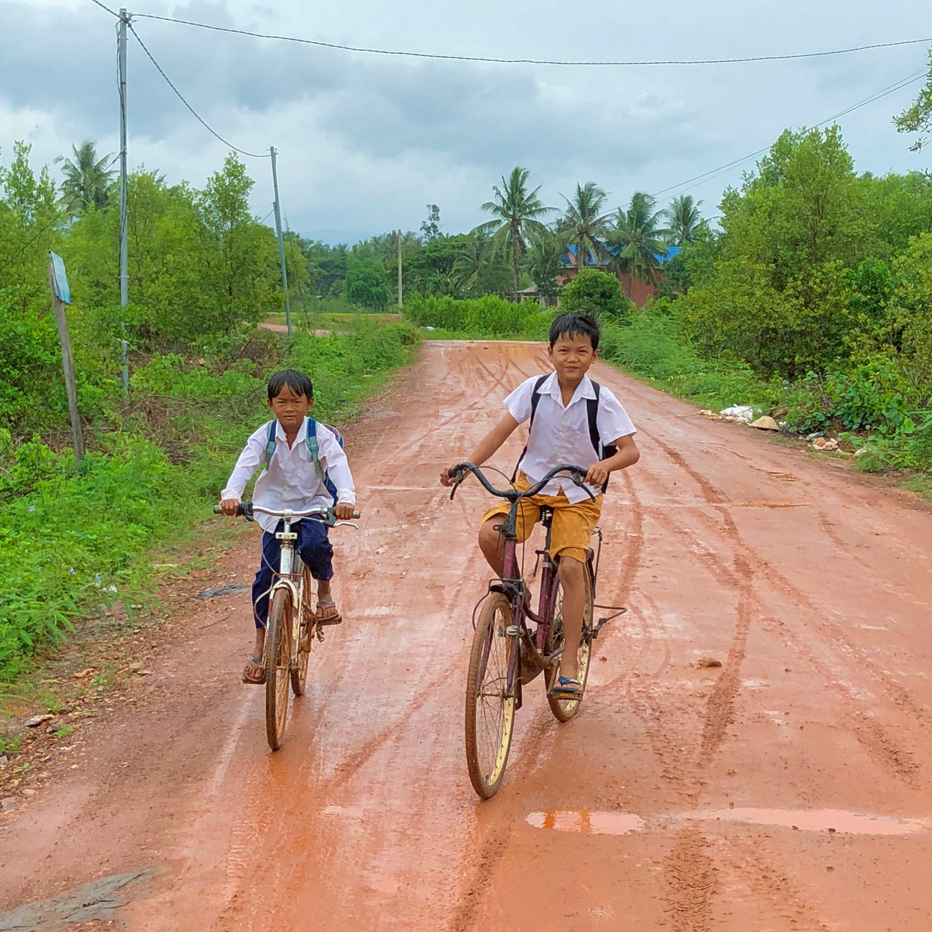 Riding Home from School, Kampot, Cambodia
