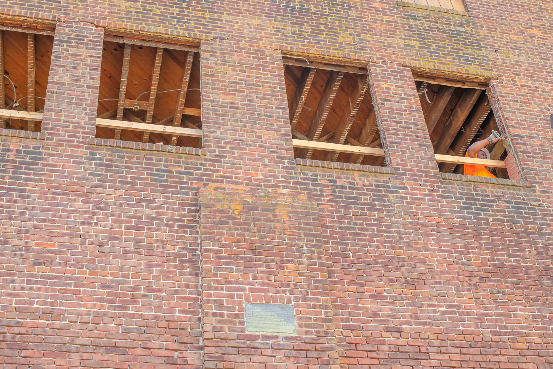 EXISTING CONDITIONS | Building exterior, openings, and restoration context.