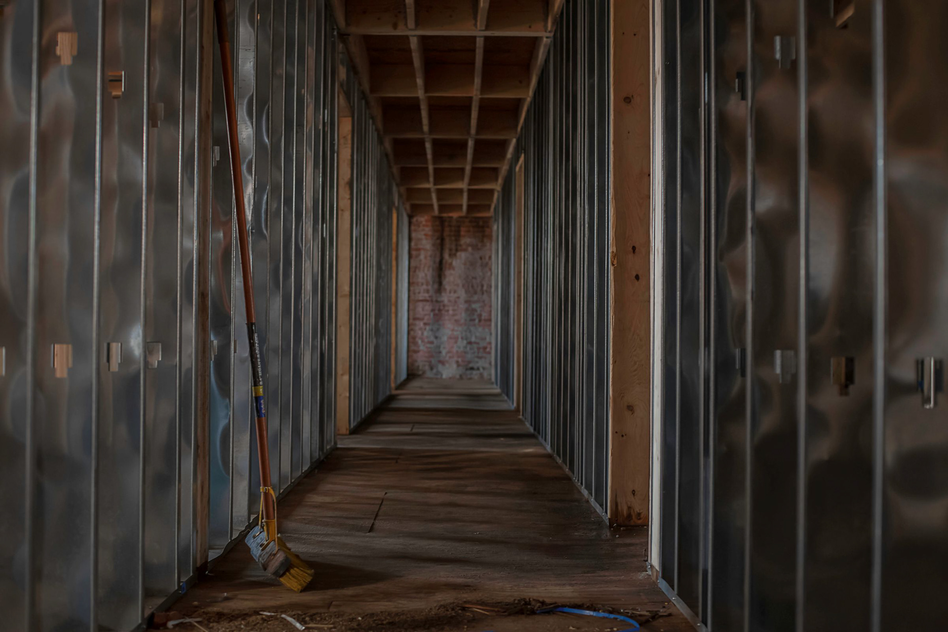 INTERIOR BUILD-OUT | Framing, corridors, and progress inside the space.