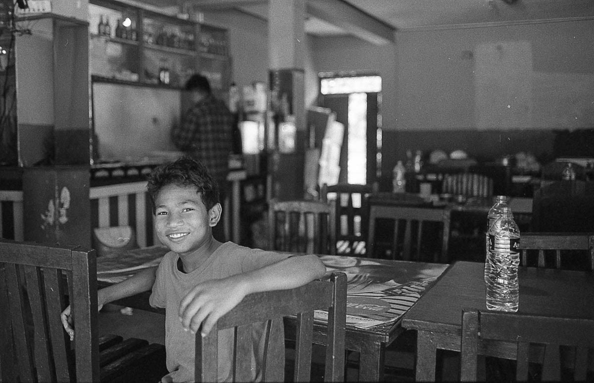 Stopping for lunch at a roadside cafe en route from the cold, snowy terrain of Manaslu to the warmth of Kathmandu.