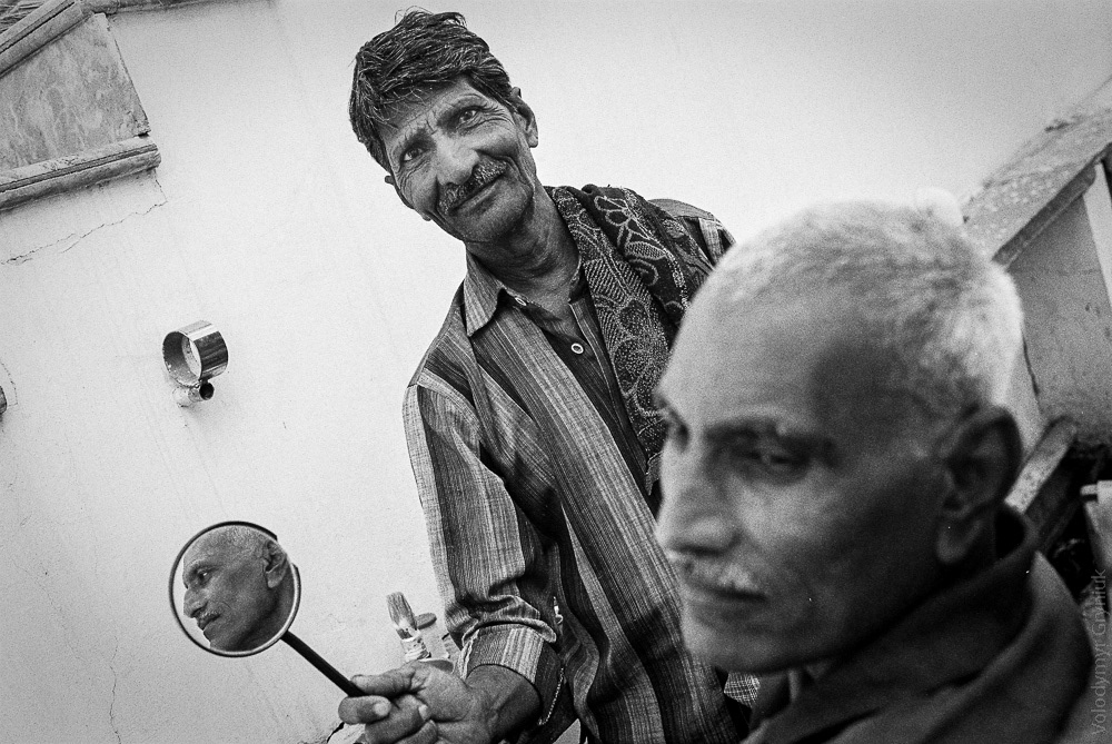 Street barber in action.