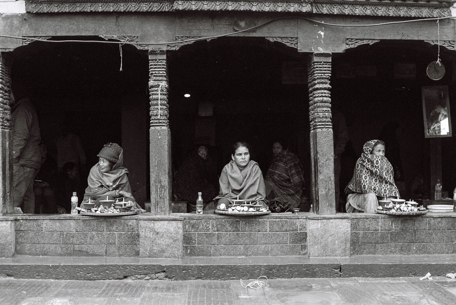 Women selling ritual lamps at the sacred Swayambu temple