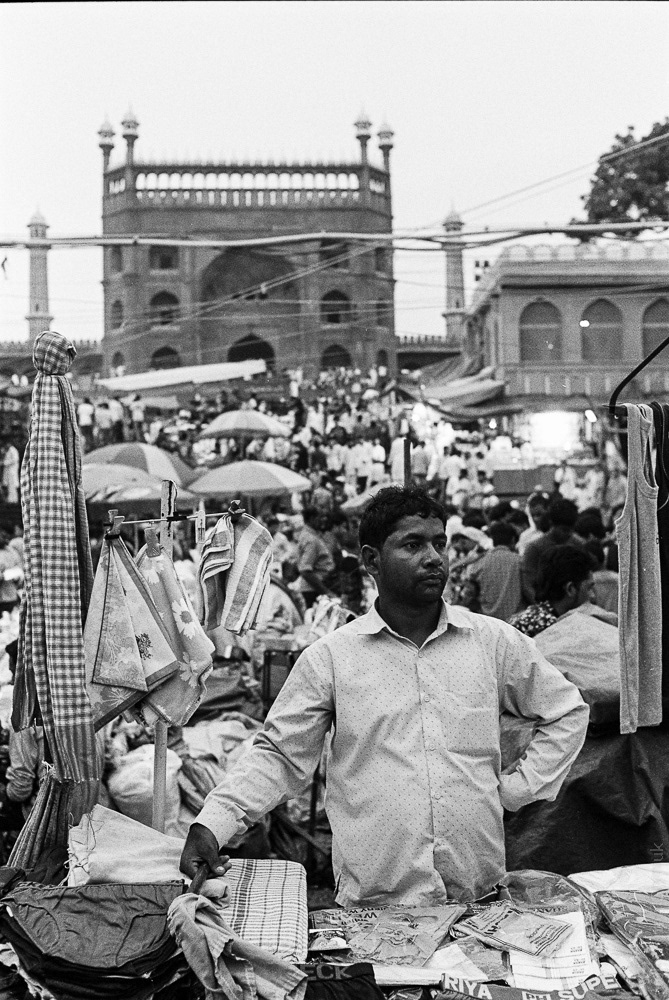 A vendor at the market situated in front of Jama Masjid, the primary Islamic location in Delhi. Despite being predominantly Hindu, it is important to note that around 30% of India's population is Muslim.