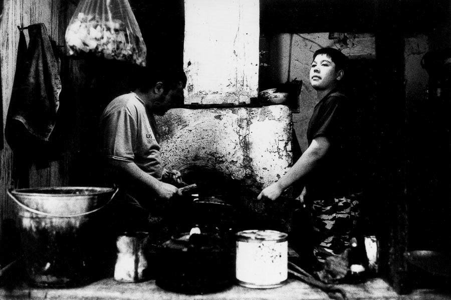 Smiths crafting traditional horseshoes that are still used by locals in rural areas of Central Asia today.