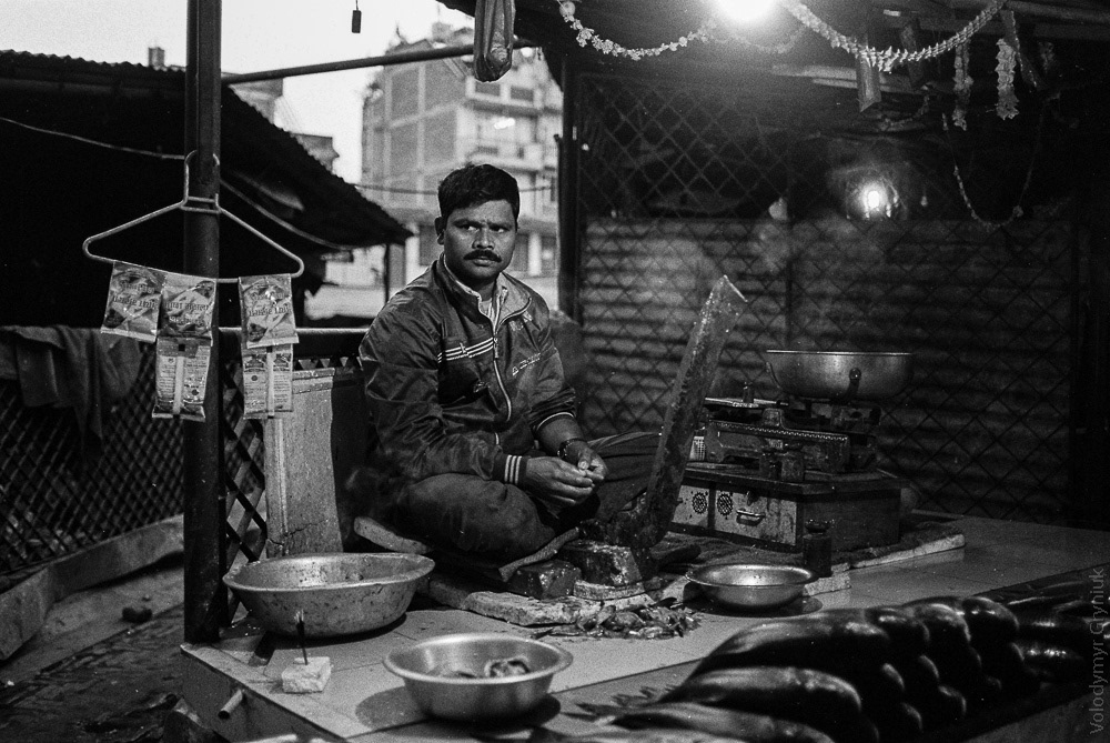 A familiar face in a changing market: A fish vendor sells his goods in the same spot in a busy Kathmandu market for years. I met him there again after several years.