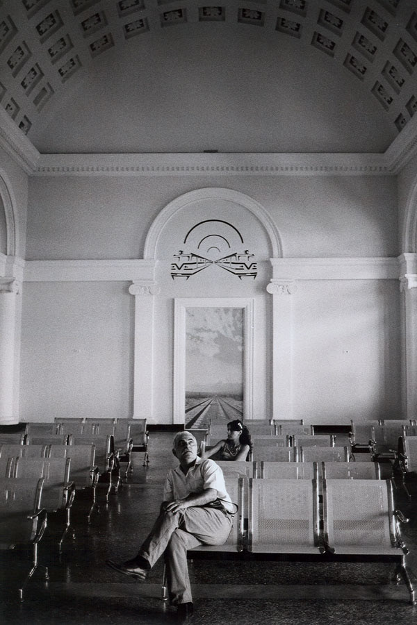 The empty hall of Yerevan train station stands as a haunting symbol of the declining rail industry in Armenia, with only a handful of trains now passing through its silent platforms.