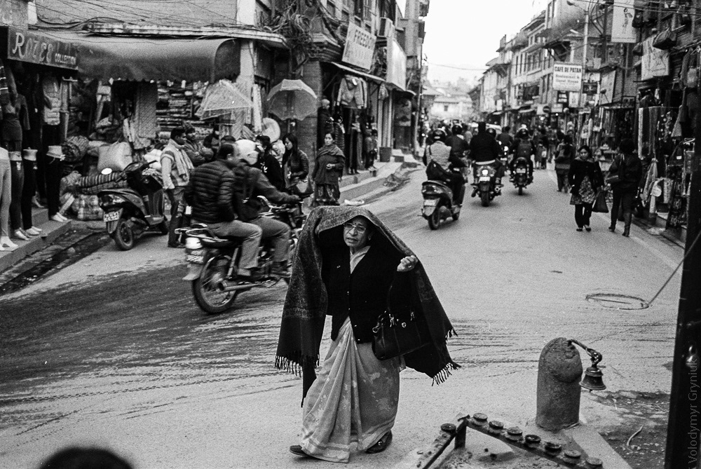 The heart of Kathmandu: The busy streets full of life as people and motorcycles weave through the city.