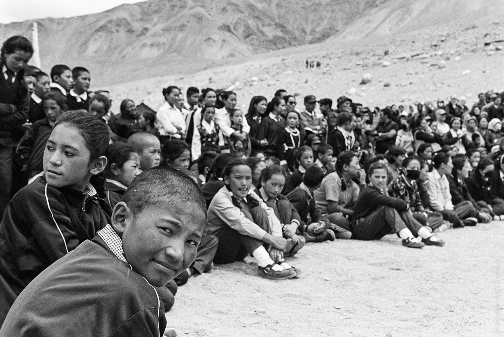 People are watching a performance dedicated to India's Independence Day celebration.
