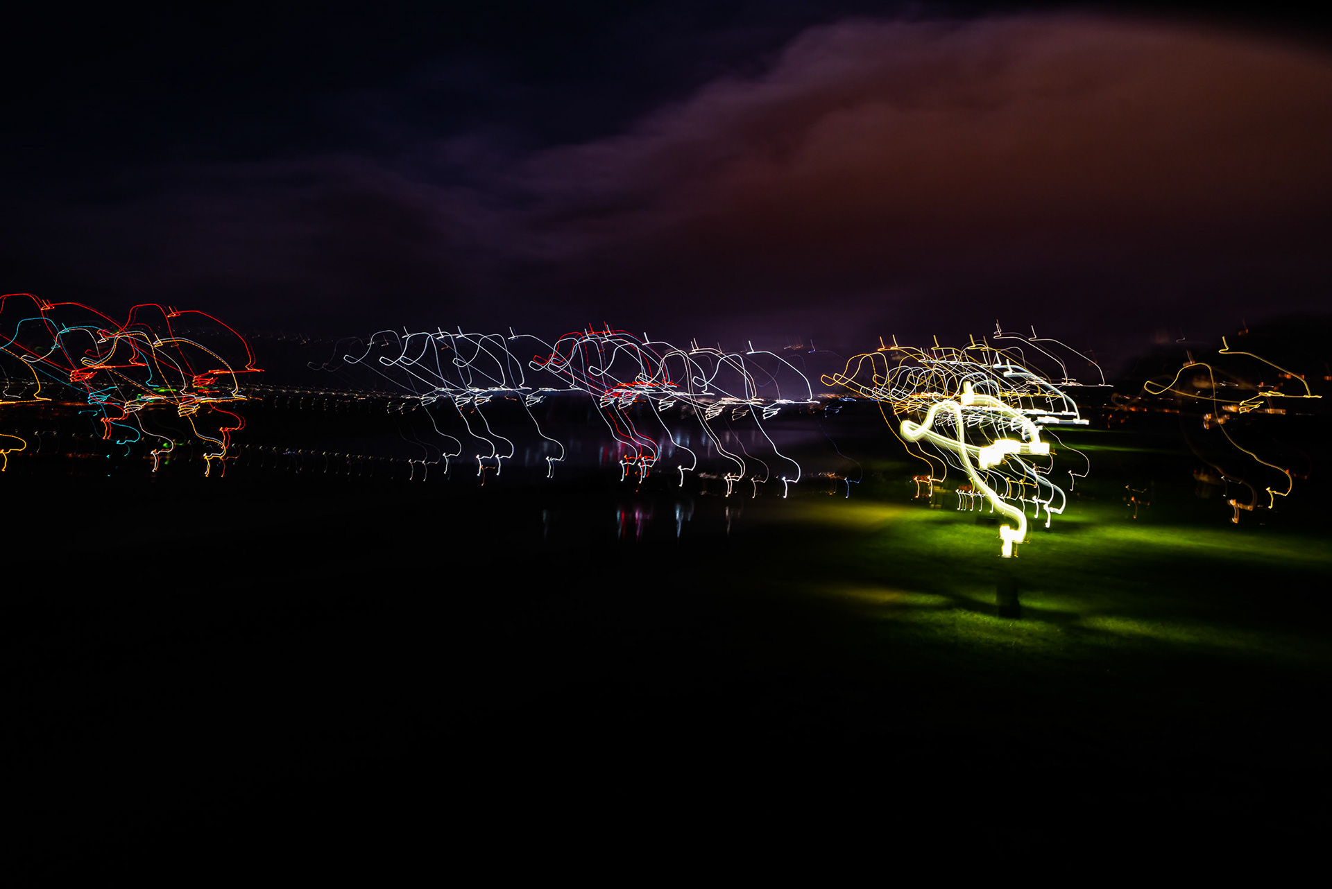 Various colours of unusually shaped light trails at night caused by Intentional Camera Movement
