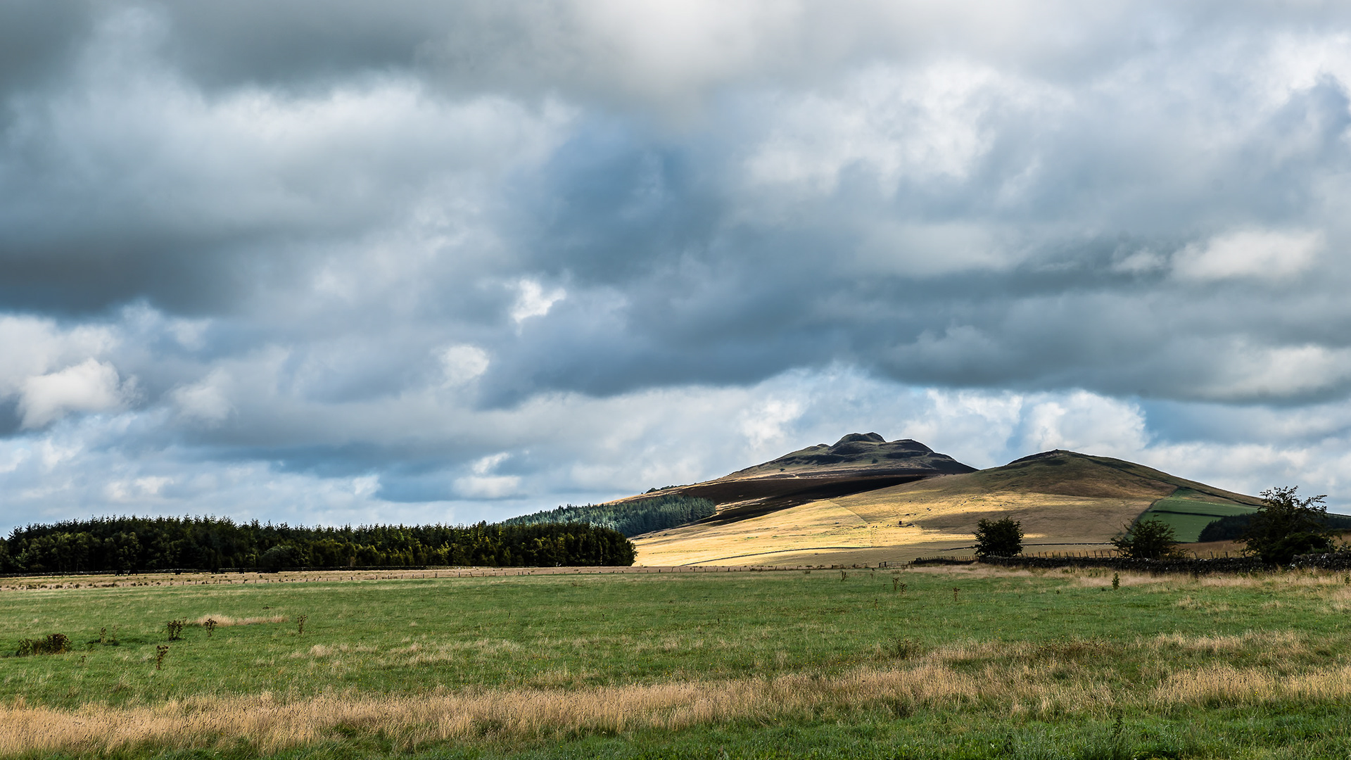 A stormy day above Rubers Law, an extinct volcano sitting beside the River Teviot and between Hawick and Jedburgh, in the Scottish Borders.