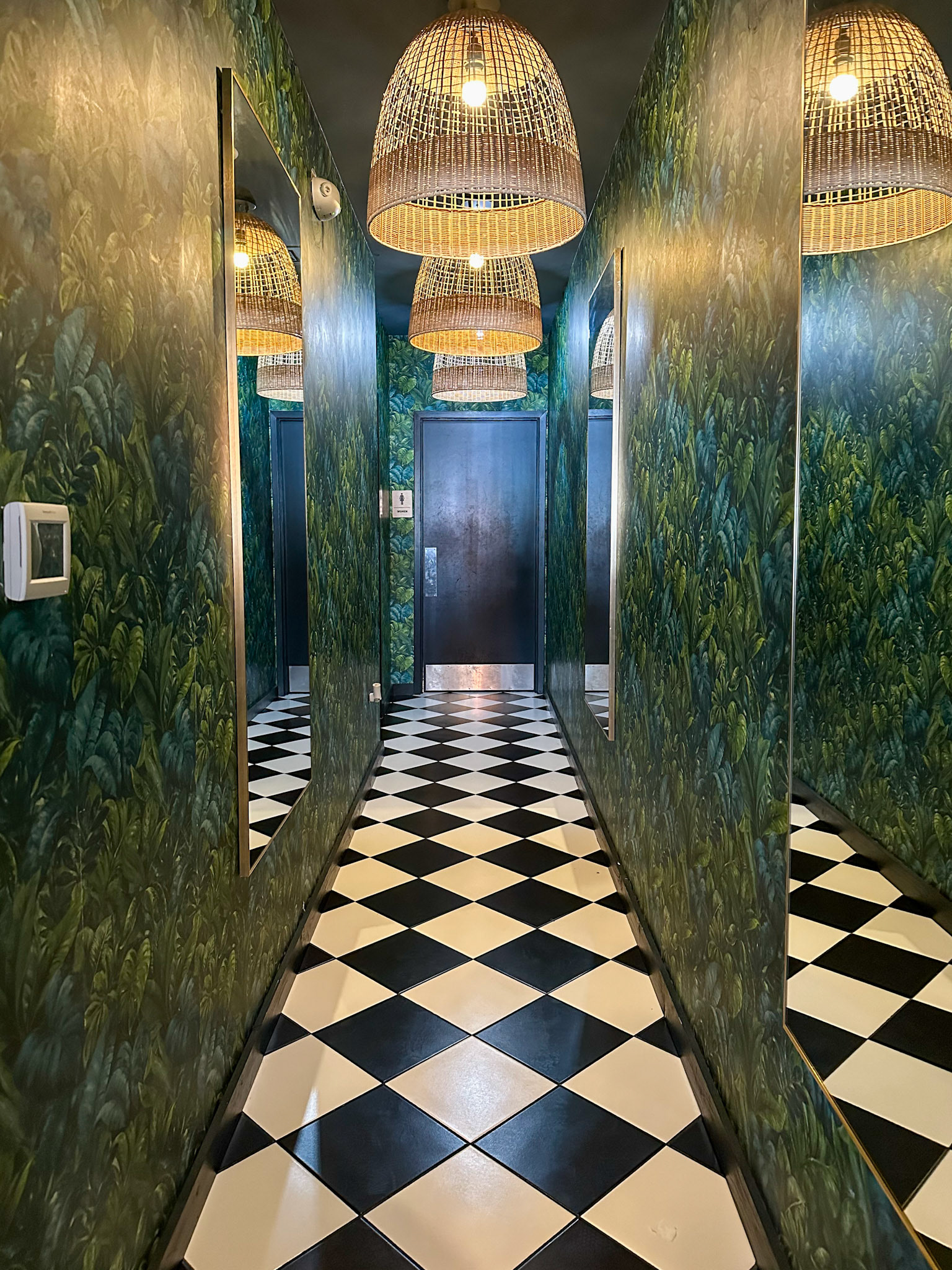 Plano, TX, US - May 25, 2025: Dramatic hallway with patterned floor and walls