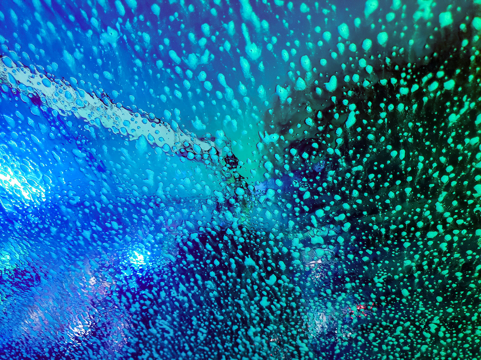 Orem, UT, US - Aug 1, 2020: Windshield passing through a car wash