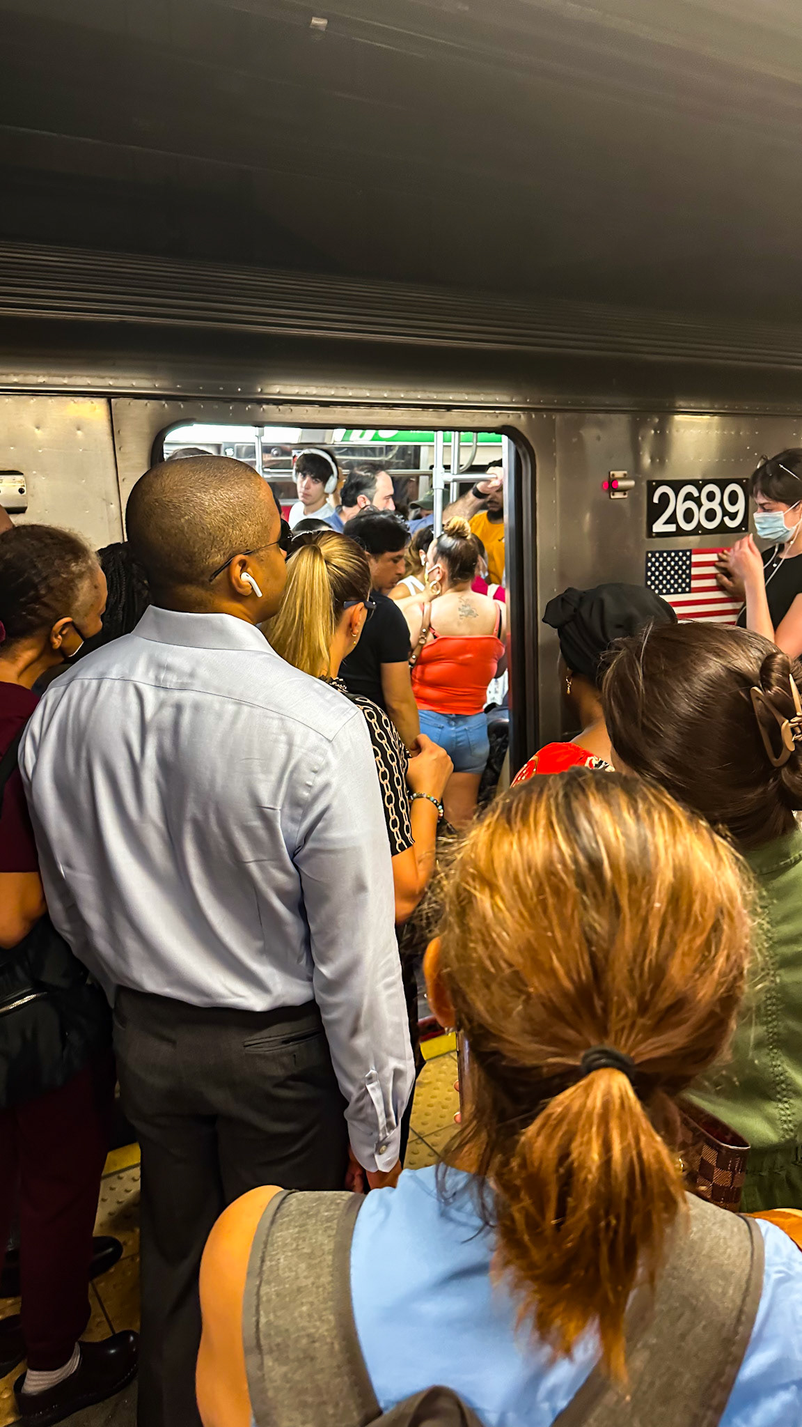 New York, NY, US - Sep 7, 2023: Passengers waiting to board crowded train at Columbus Circle