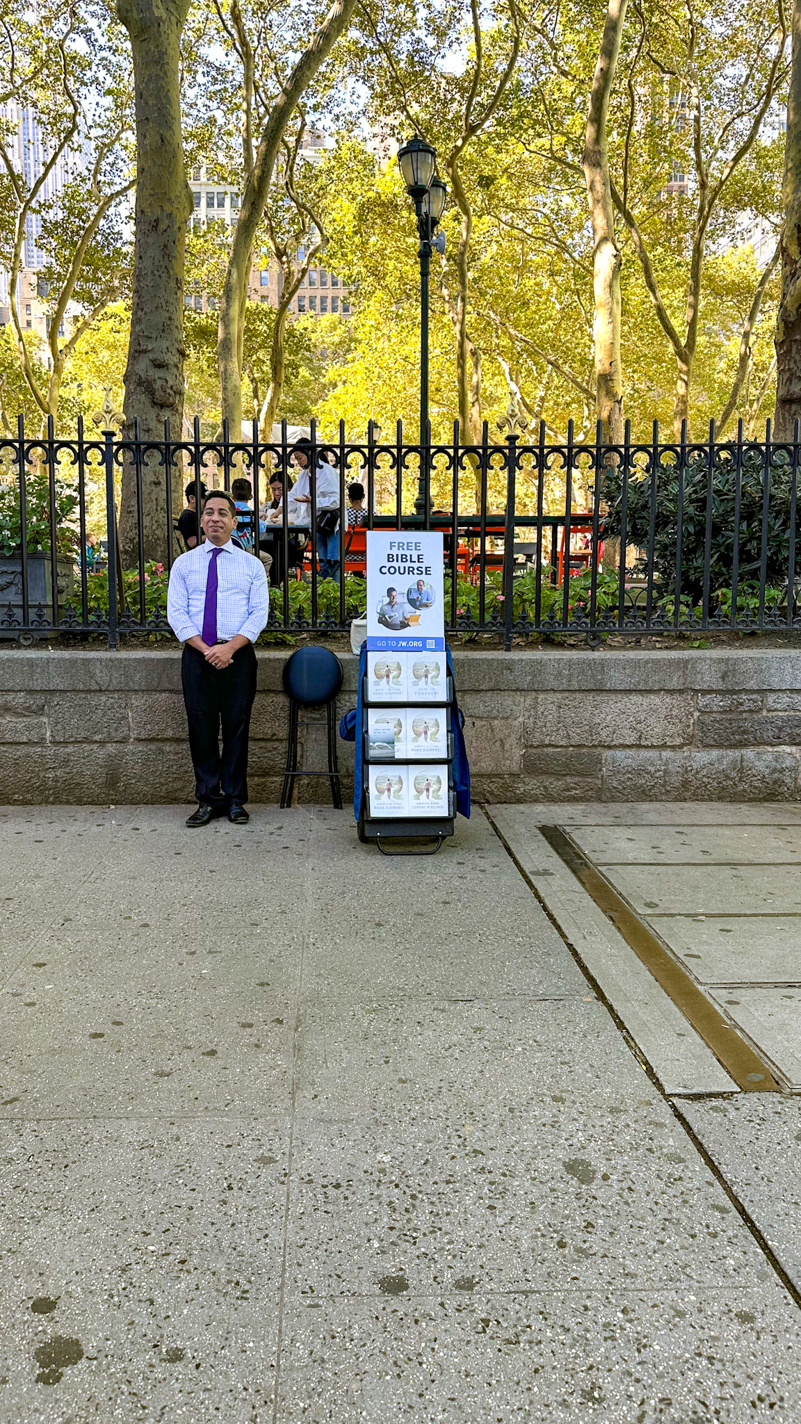 New York, NY, US - Sep 1, 2023: Person displaying "free Bible course" outside Bryant Park