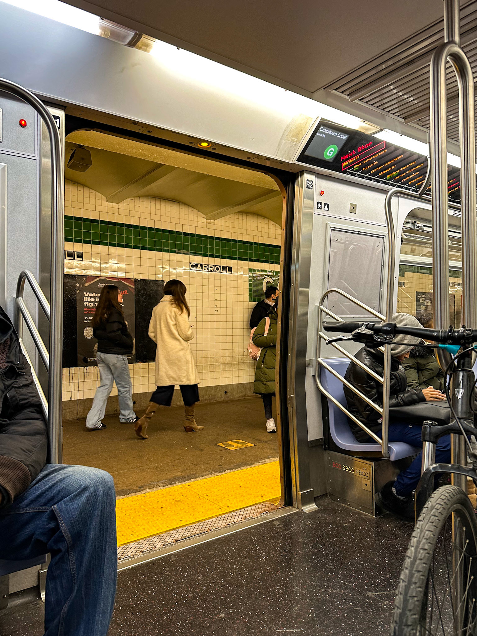 Brooklyn, NY, US - Dec 20, 2023: View from G train stopped with doors open at Carroll St