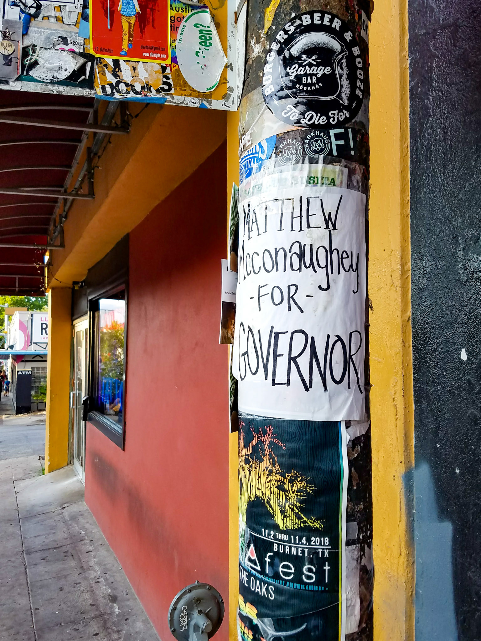 Austin, TX, US - Jun 18, 2018: Homemade signs on lamppost, Matthew McConaughey for governor