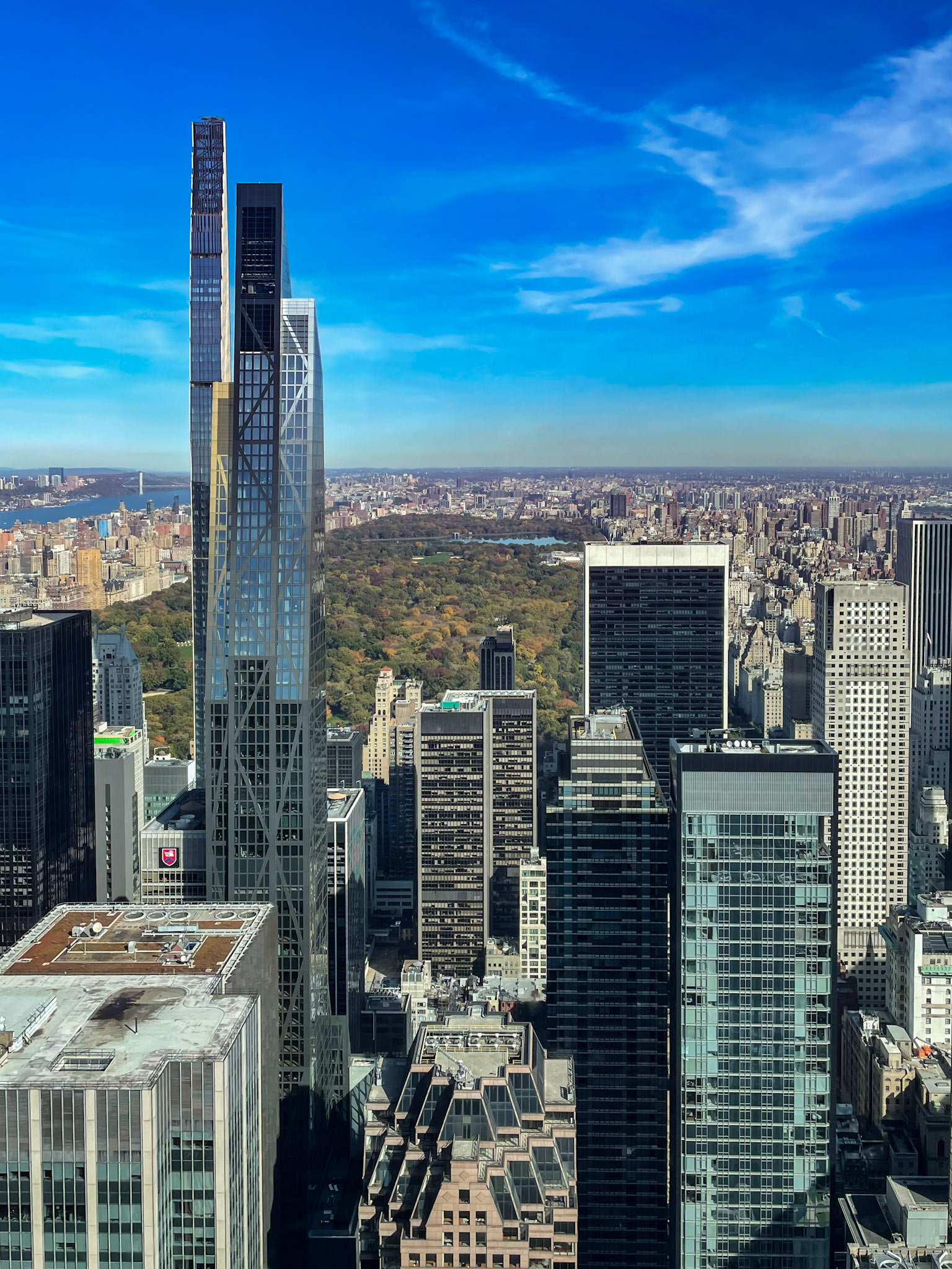 New York, NY, US - Oct 30, 2022: Central Park and Manhattan buildings with blue sky