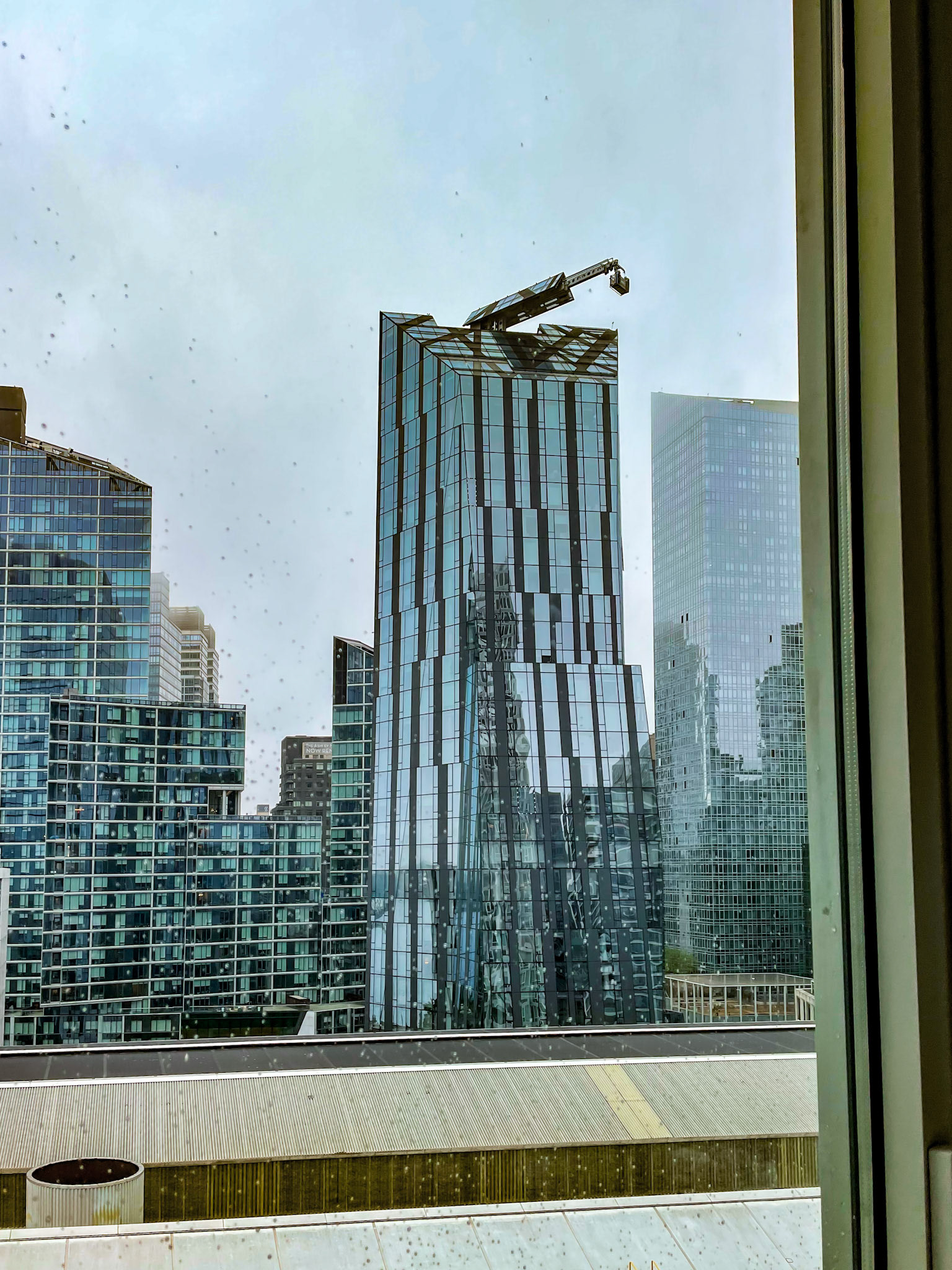 New York, NY, US - Sep 12, 2022: Manhattan skyscraper with roof open for window cleaning