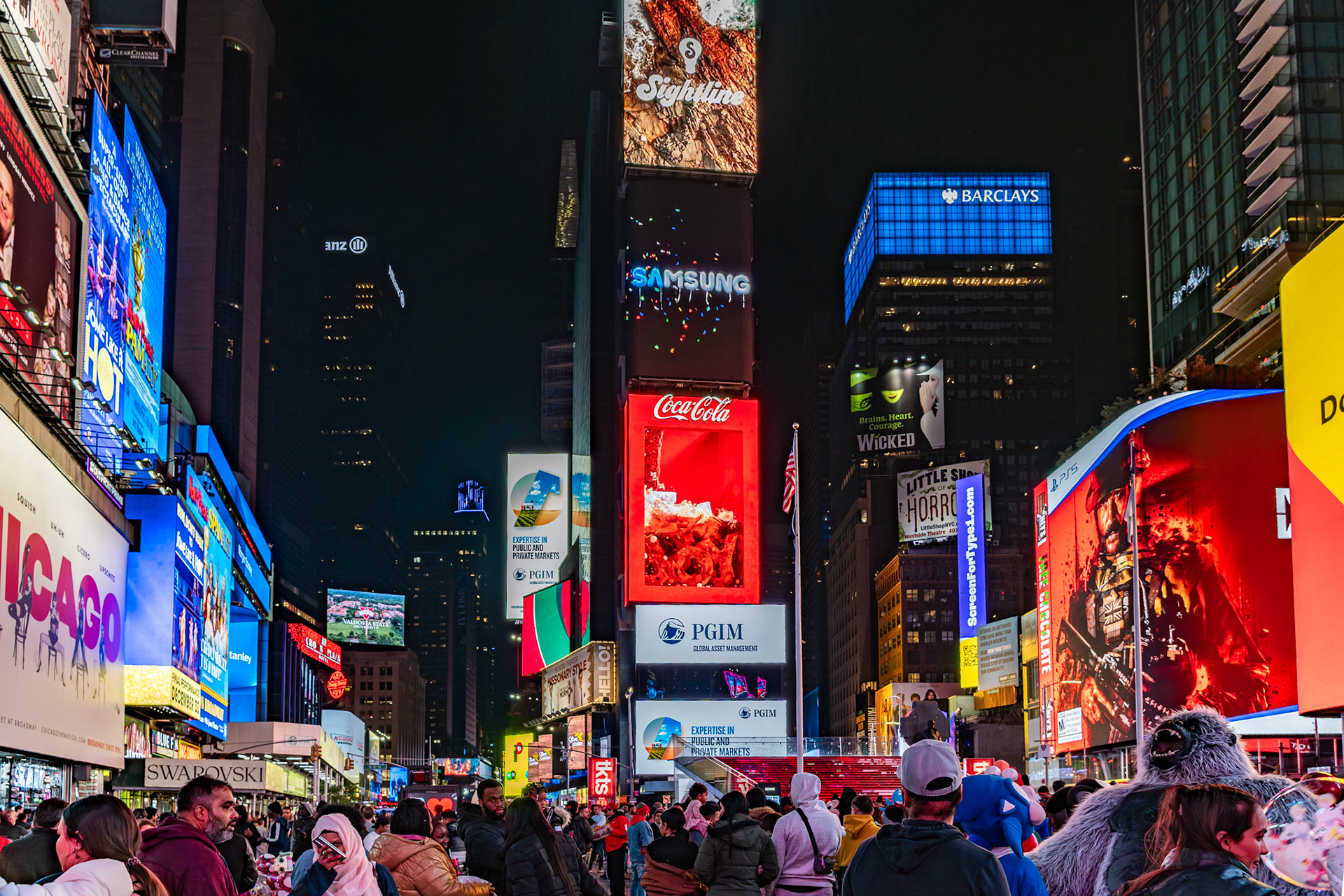 New York, NY, US - Nov 4, 2023: Crowds and ads in Times Square