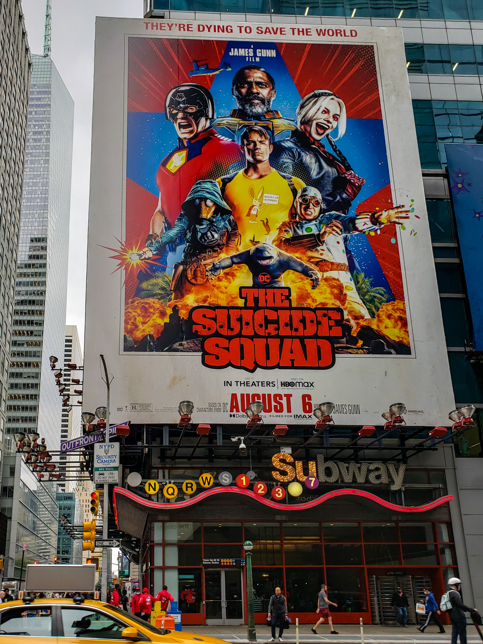 New York, NY - Oct 6, 2021: Suicide Squad movie poster above Times Square subway station
