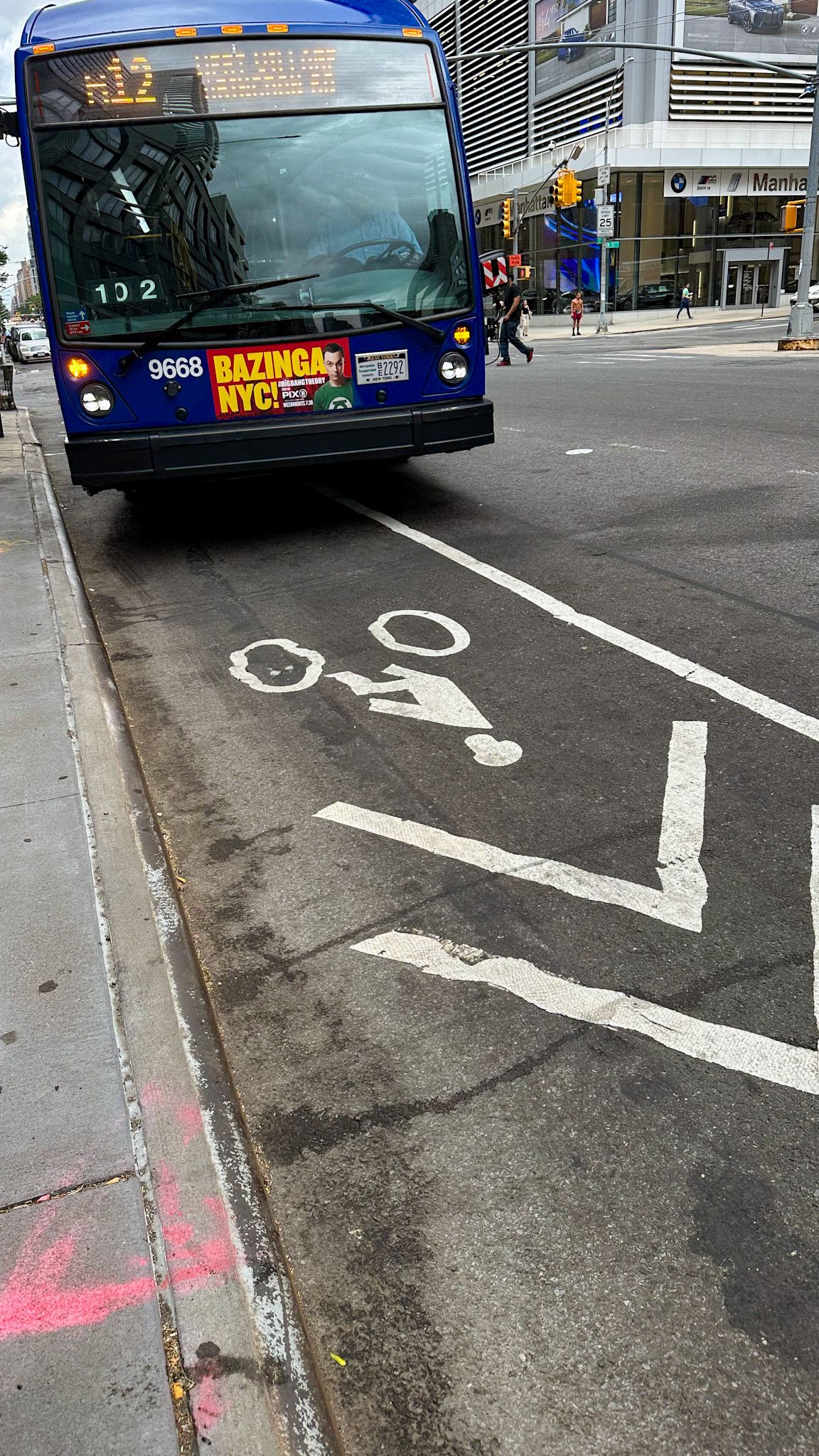 New York, NY, US - Aug 24, 2023: M12 bus arriving at curb