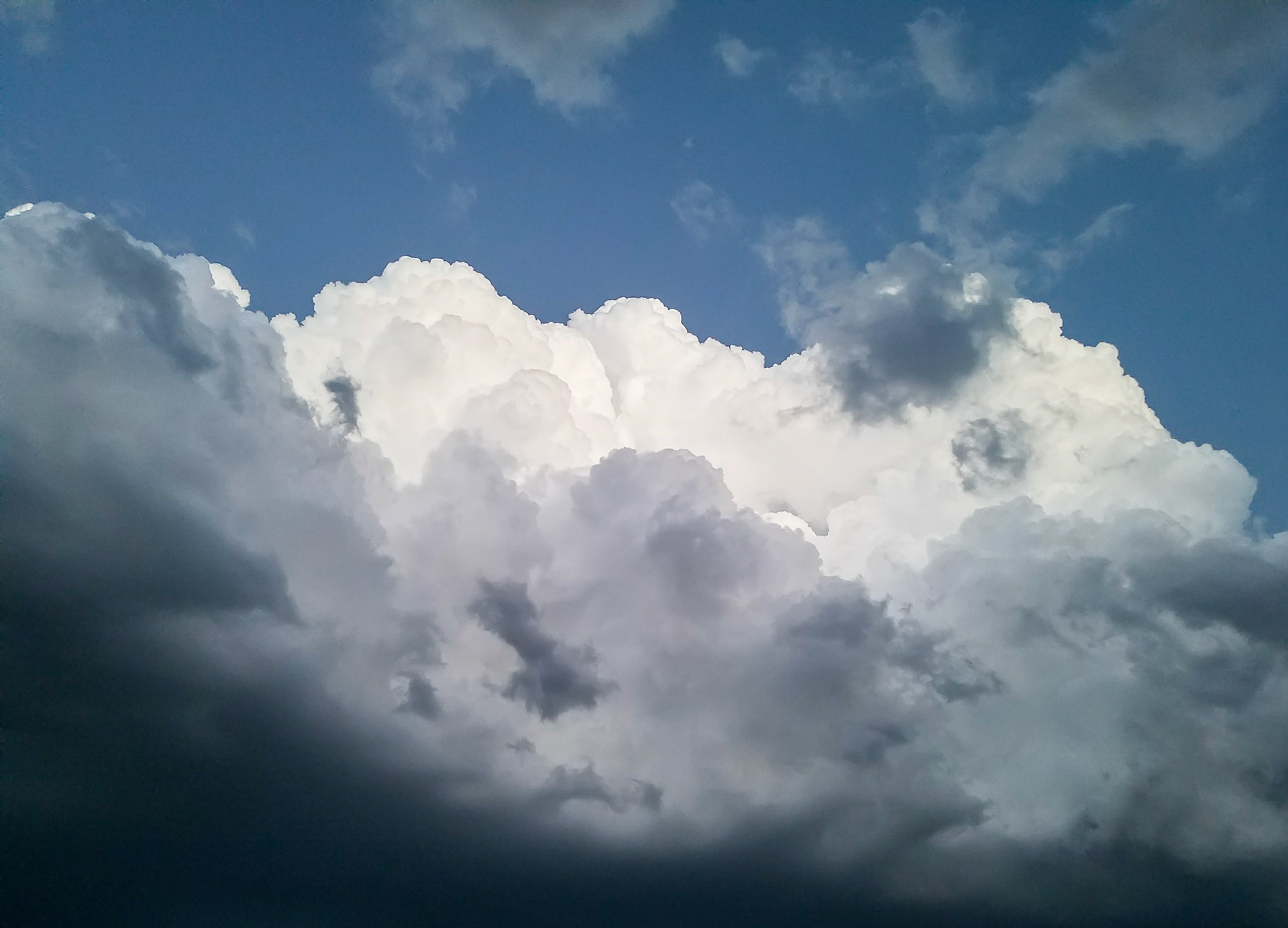Wylie, TX, US - Apr 4, 2017: Layers of puffy clouds in gray and white