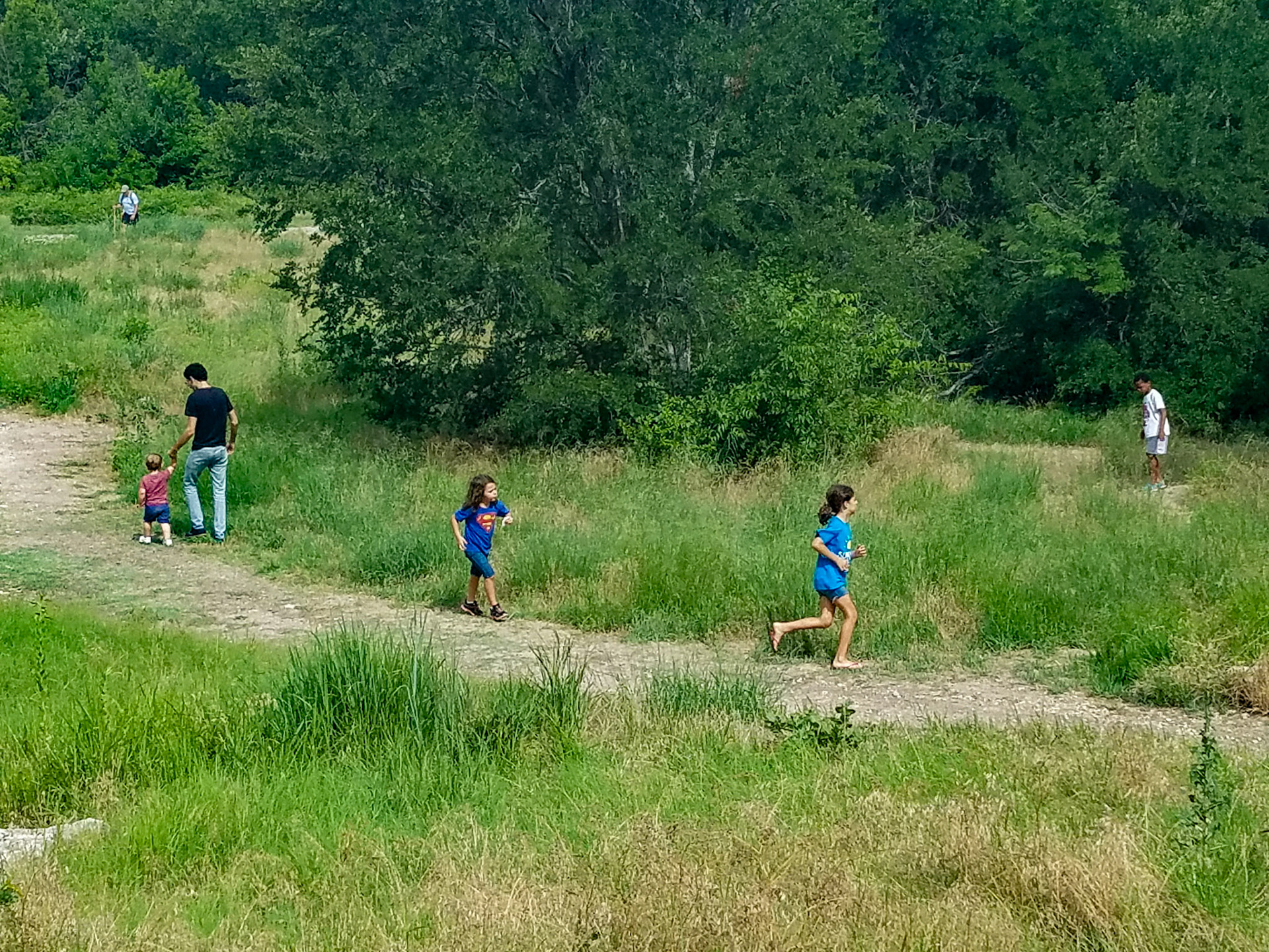 Frisco, TX, US - Jun 17, 2017: Children and adults enjoying Arbor Hills Nature Preserve