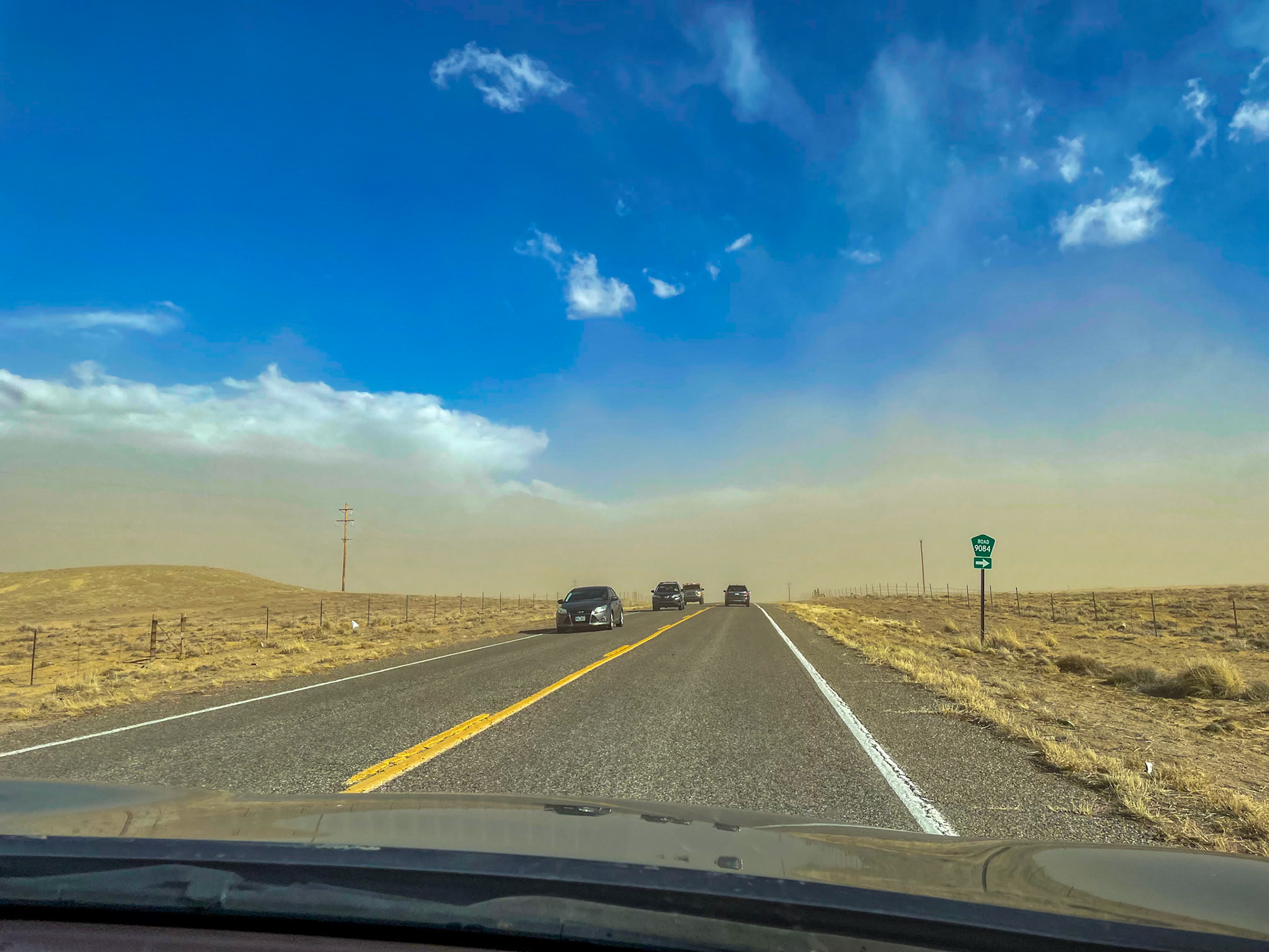 Towaoc, CO, US - Mar 4, 2022: Driving on a dusty desert road