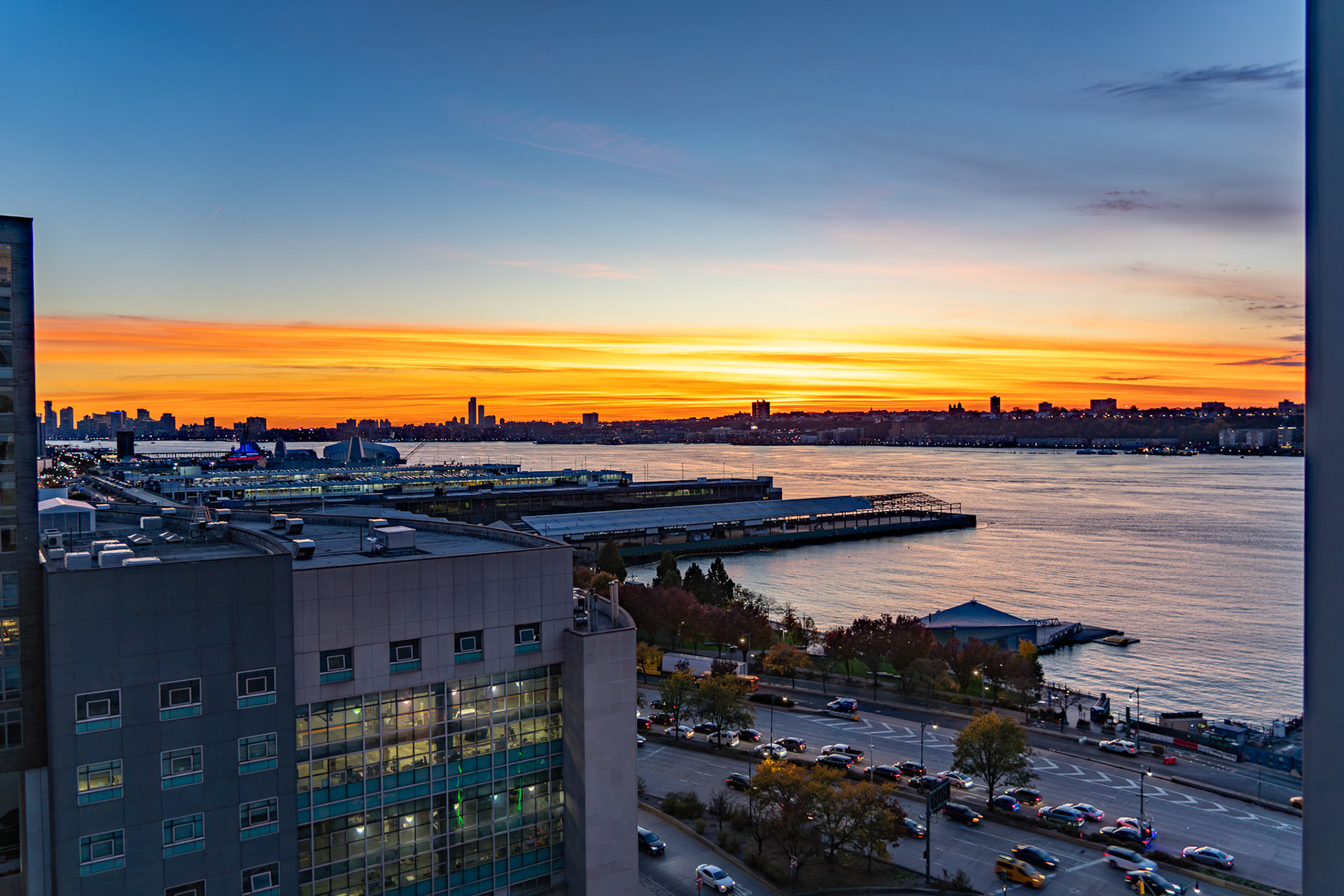 New York, NY, US - Nov 8, 2023: Horizontal sunset over Hudson River