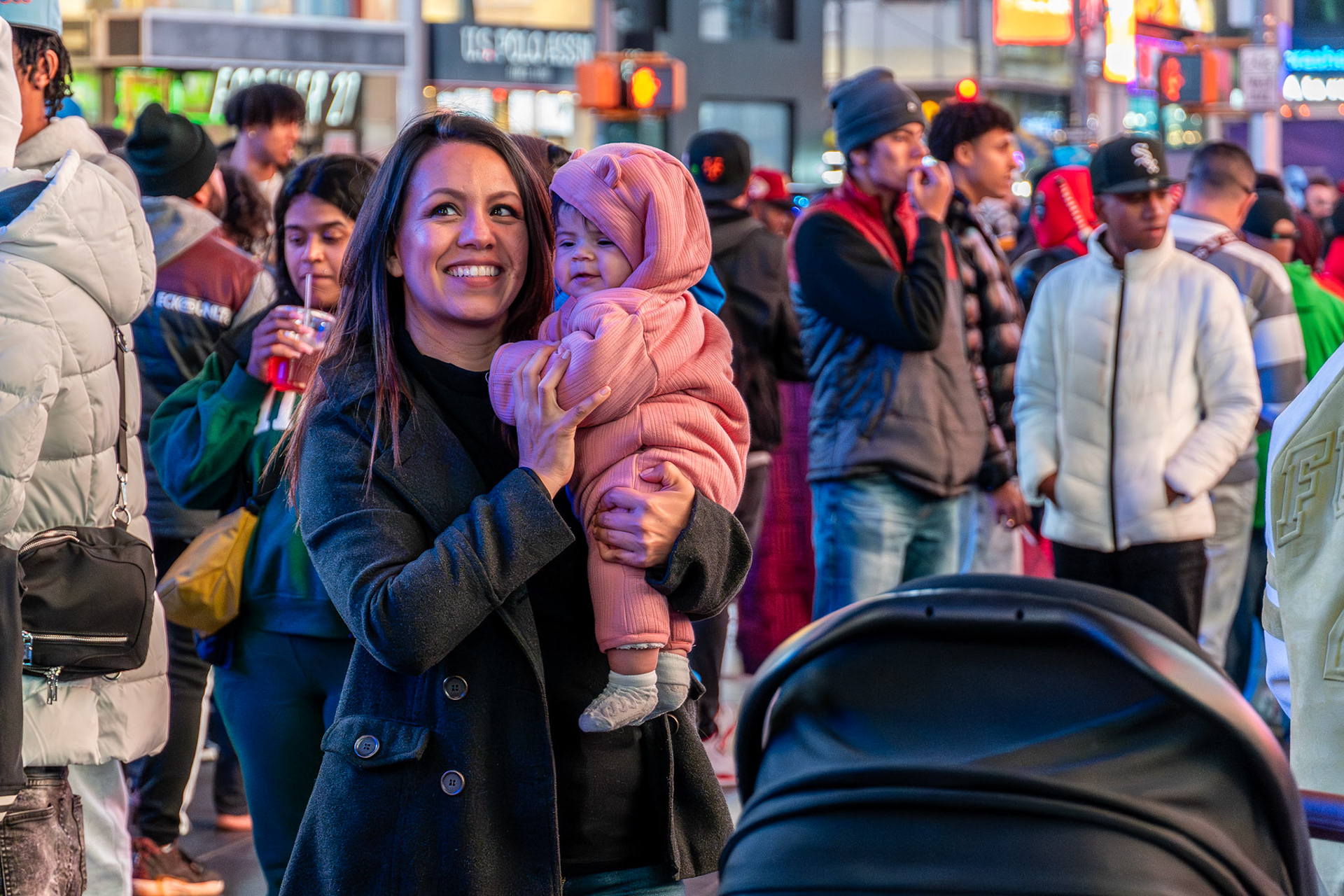 Posing with baby in Times Square, November 2023