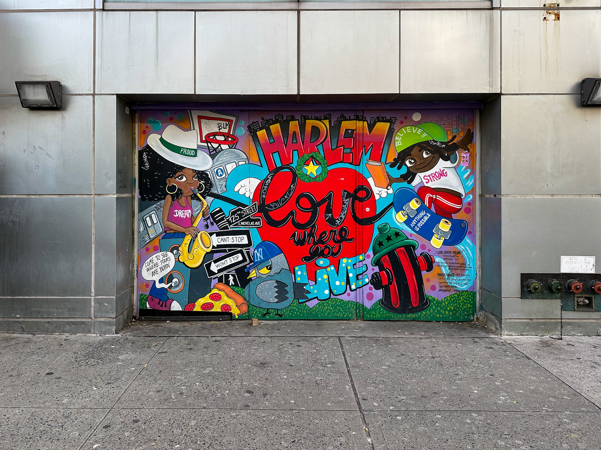 New York, NY, US - Dec 14, 2023: 125th Street Harlem mural, love where you live