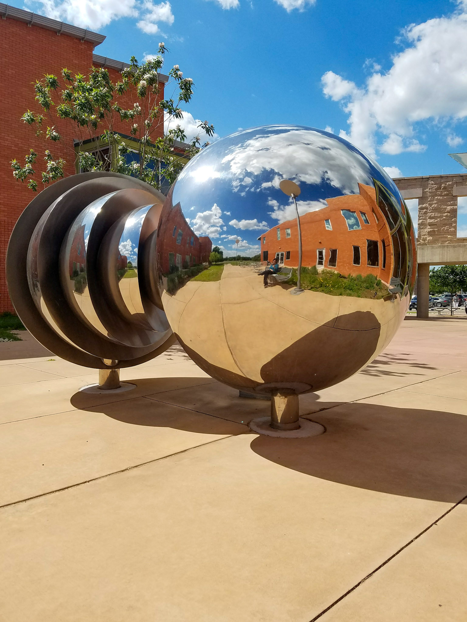 Wylie, TX, US - May 4, 2017: Reflection selfie in artwork outside Smith Public Library