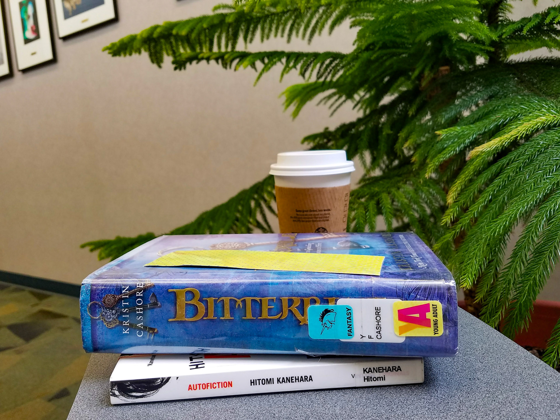 Richardson, TX, US - Jul 15, 2017: Library books and coffee