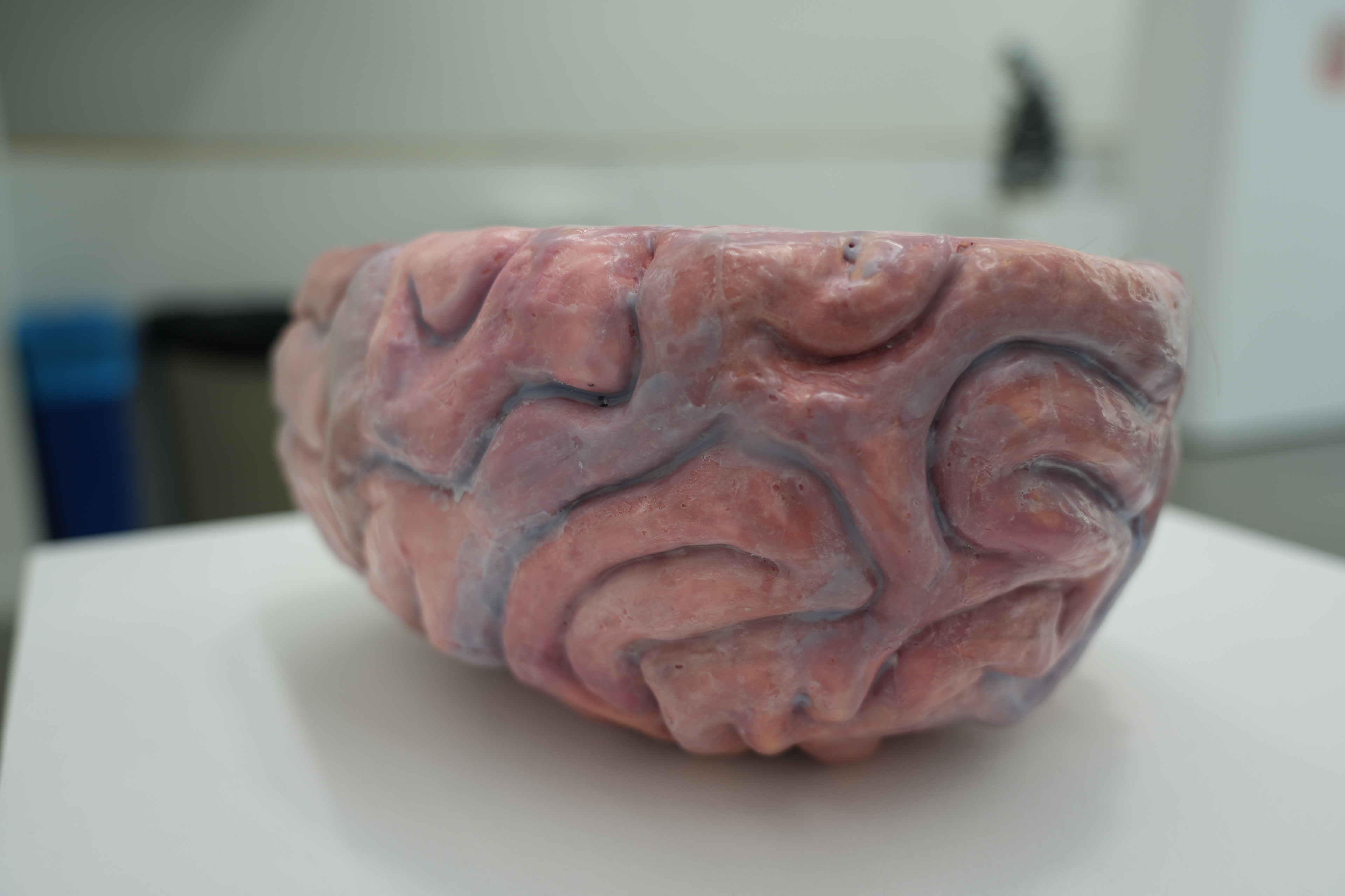 Mind-Space (ceramic sculpture with wax finish, paint, tissue paper, and Barbie doll)