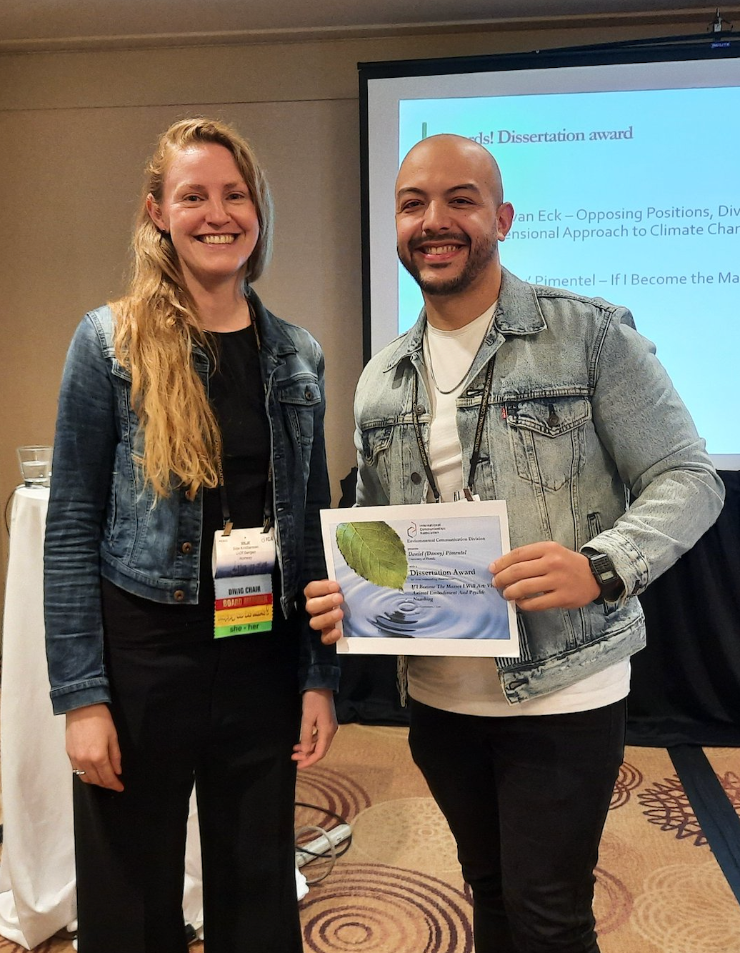 Receiving the Dissertation of the Year Award (2023) at the International Communication Association Conference in Toronto, Canada (Environmental Communication Division)