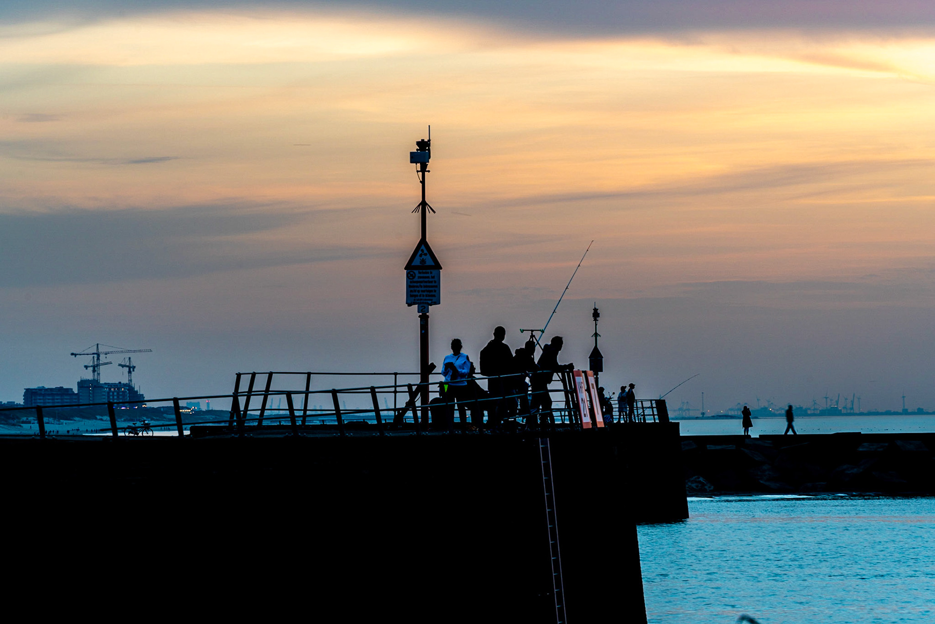 20 - Fishing during sunset in Scheveningen