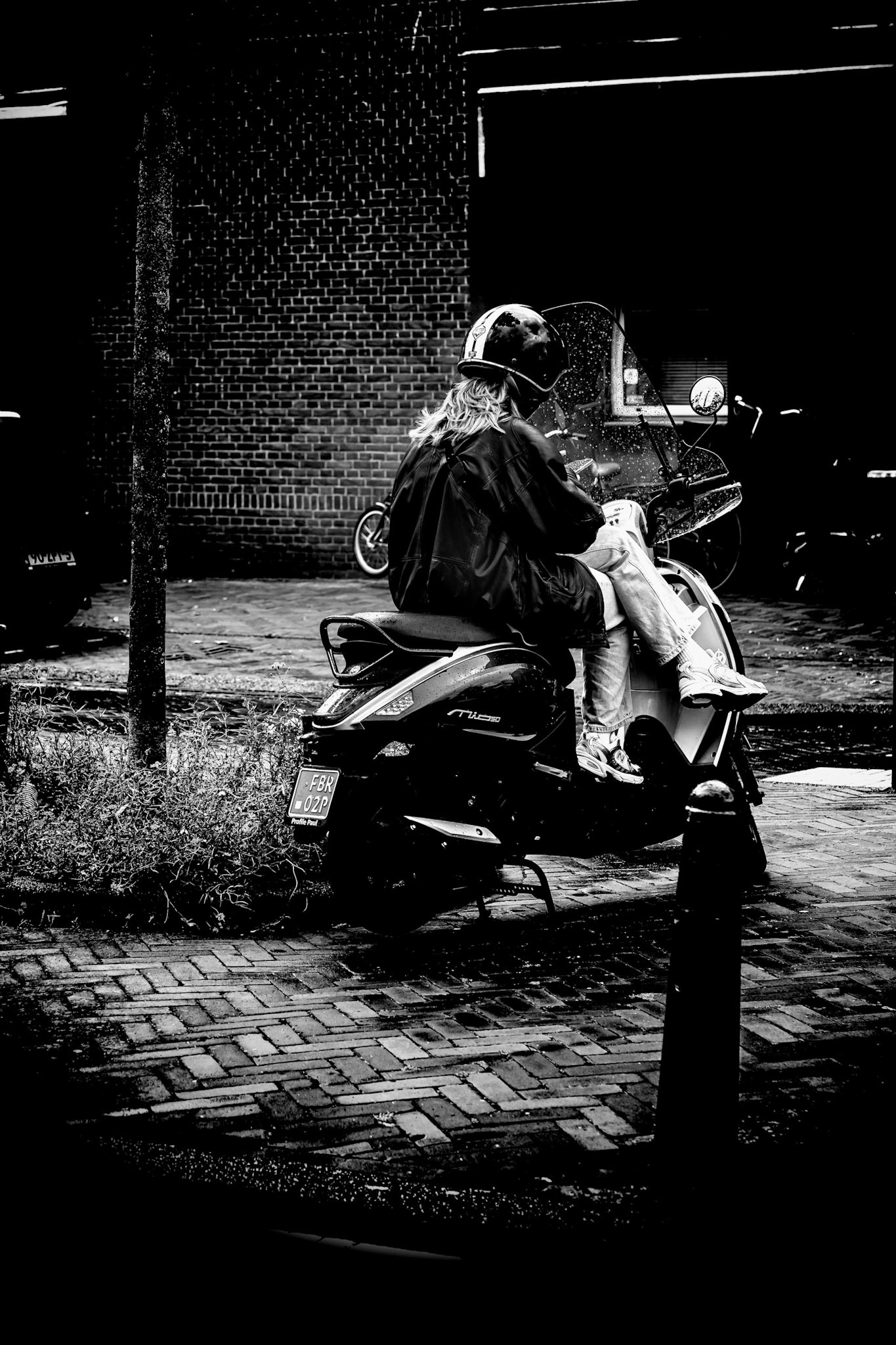 20 - girl on a scooter waiting