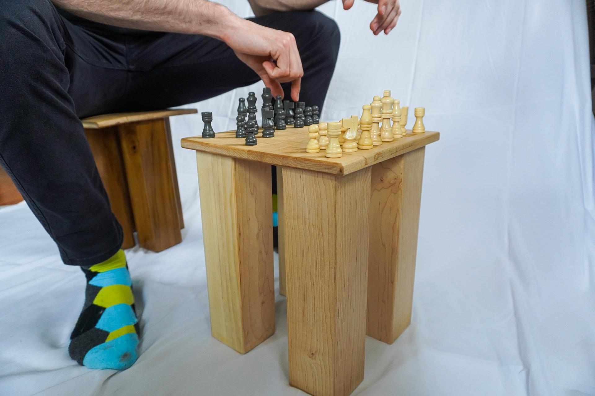 as a chess board and stool