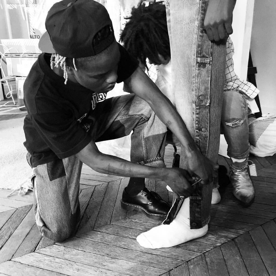 Ian Connor and Virgil Abloh standing together in Paris, both wearing streetwear-inspired outfits. Early 2010s photo that reflects the merging of street culture with luxury fashion.