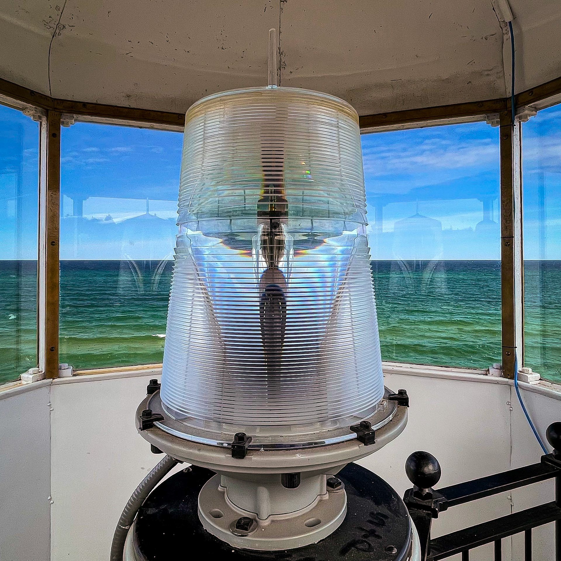 The light atop historic Crisp Point Lighthouse. one of the most remote lighthouses on the shore of Lake Superior. looking out towards Canada.