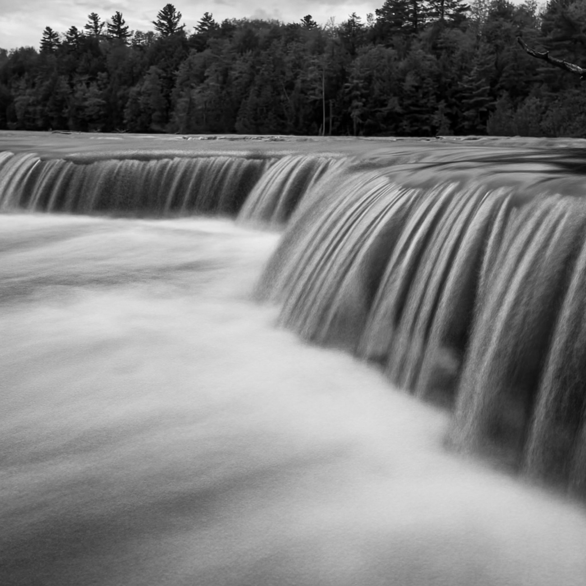 Slow motion capture of water flowing over the lower falls at Tahquamenon Falls State Park.