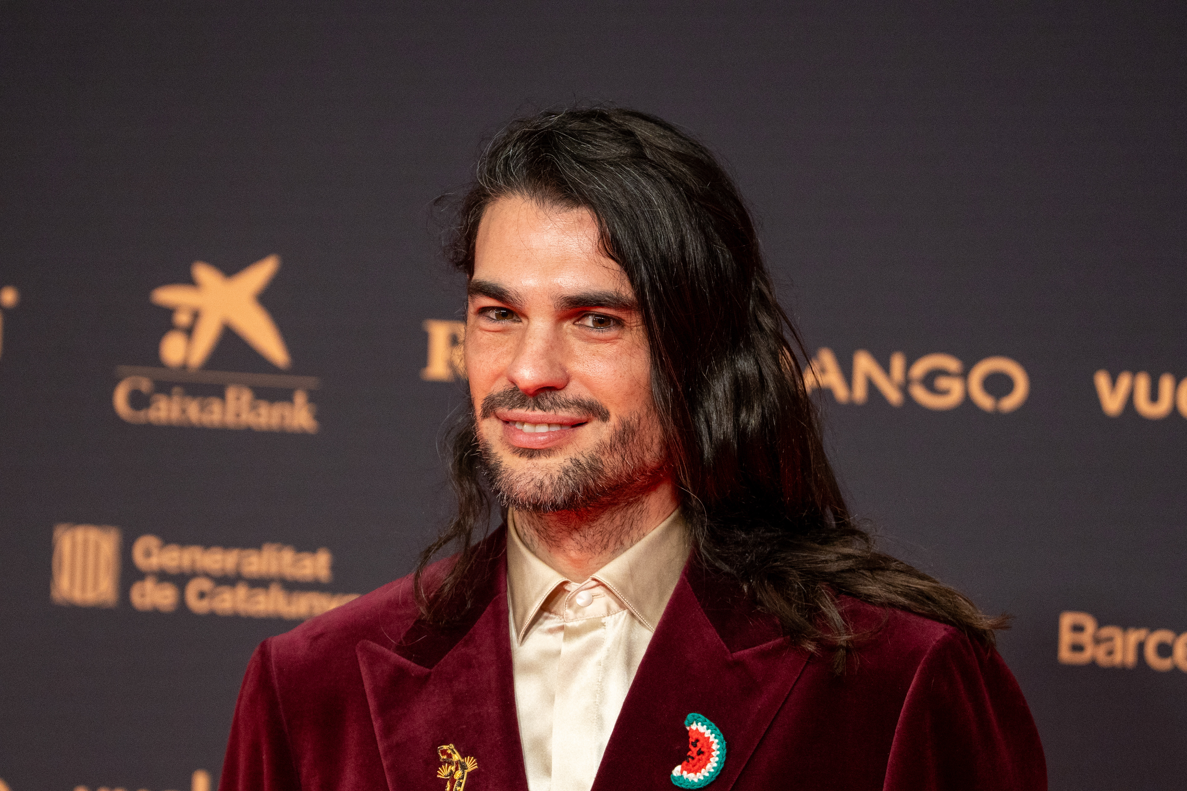 Spanish filmmaker Oliver Laxe posing on the red carpet during the Goya Cinema Awards ceremony