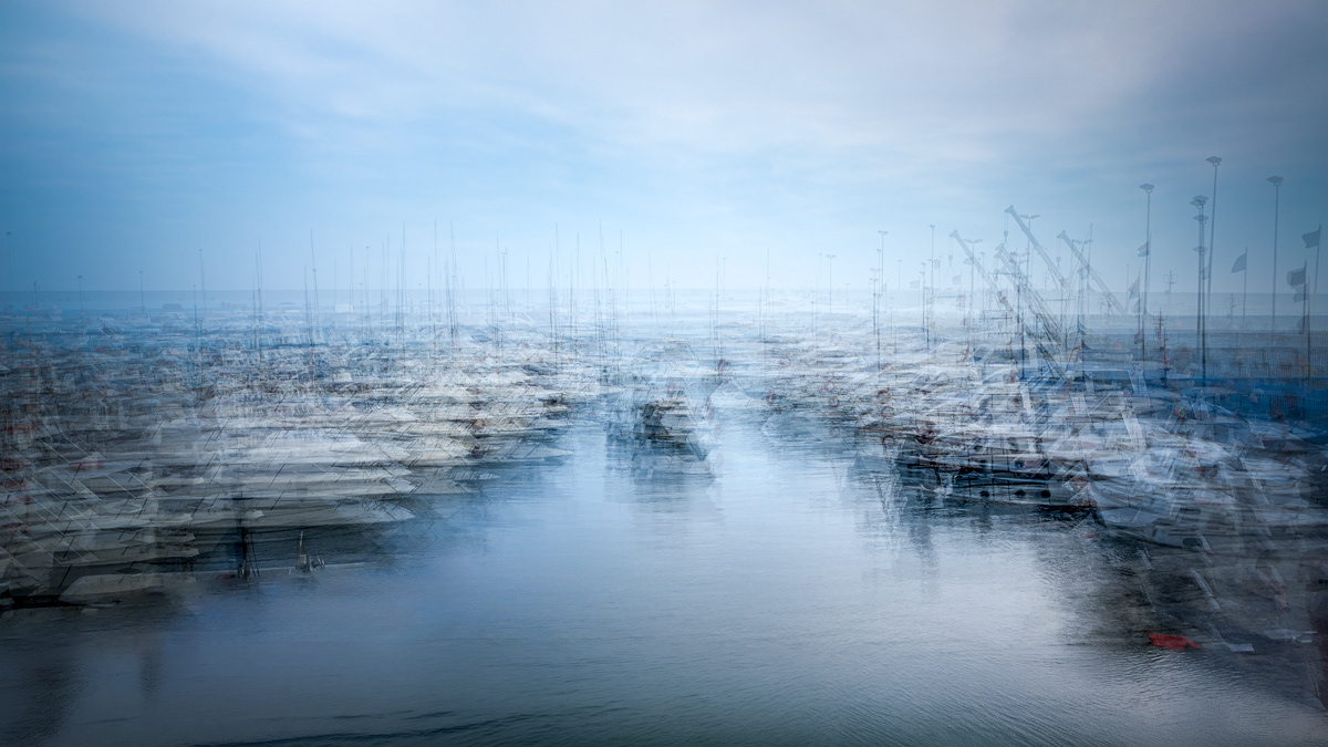 Nicole Holz - Fine Art Editions |  Porto Diano Marina | Multi-layered in-camera exposures captured strictly on location along the Ligurian coast. By fusing the raw dynamics of sea and light with the delicate geometry of harbors into fluid, impressionistic sanctuaries, this series stands as a testament to deliberate human craftsmanship and authentic vision in a digital age.