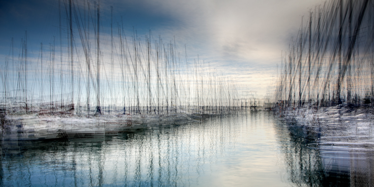 Nicole Holz - Fine Art Editions |  Porto St. Stefano al Mare | Multi-layered in-camera exposures captured strictly on location along the Ligurian coast. By fusing the raw dynamics of sea and light with the delicate geometry of harbors into fluid, impressionistic sanctuaries, this series stands as a testament to deliberate human craftsmanship and authentic vision in a digital age.